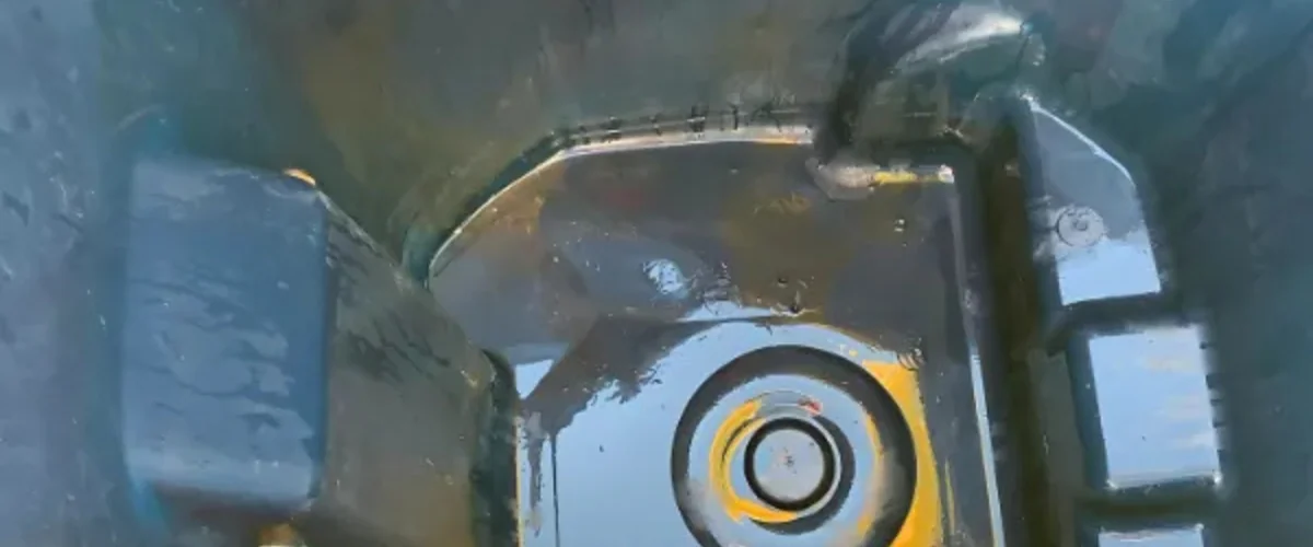 Dirty trash bin interior with heavy grime buildup before professional bin cleaning service