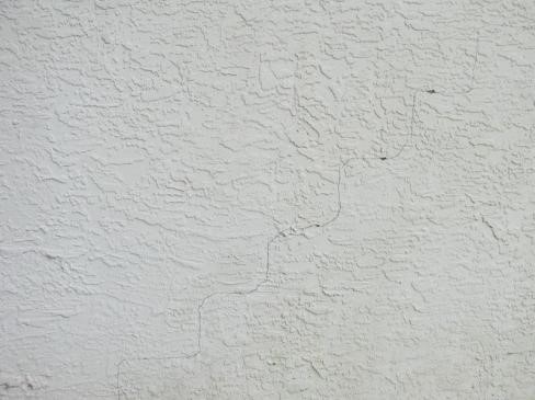 Stair step stucco cracking