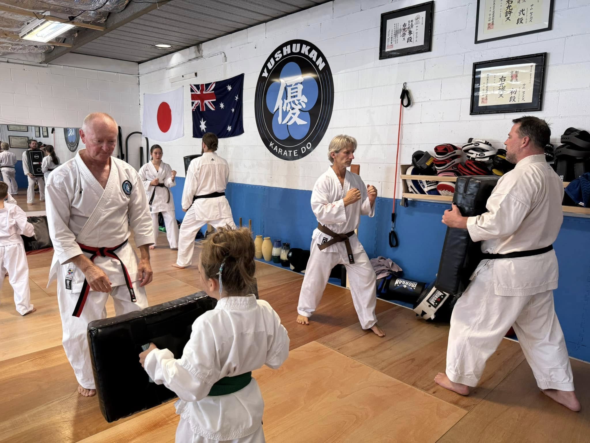 Yushukan karate students and sensei doing a karate session Yushukan karate students and sensei doing a karate session