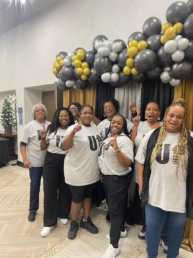 Empowerment Speaker event with women celebrating together