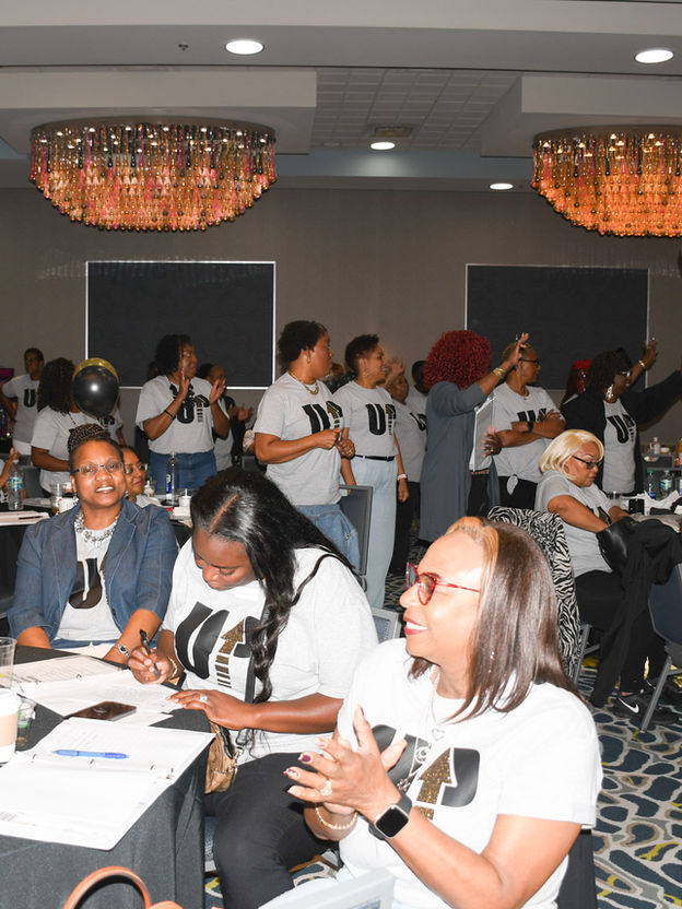 Love Every Minute movement conference participants smiling and connecting