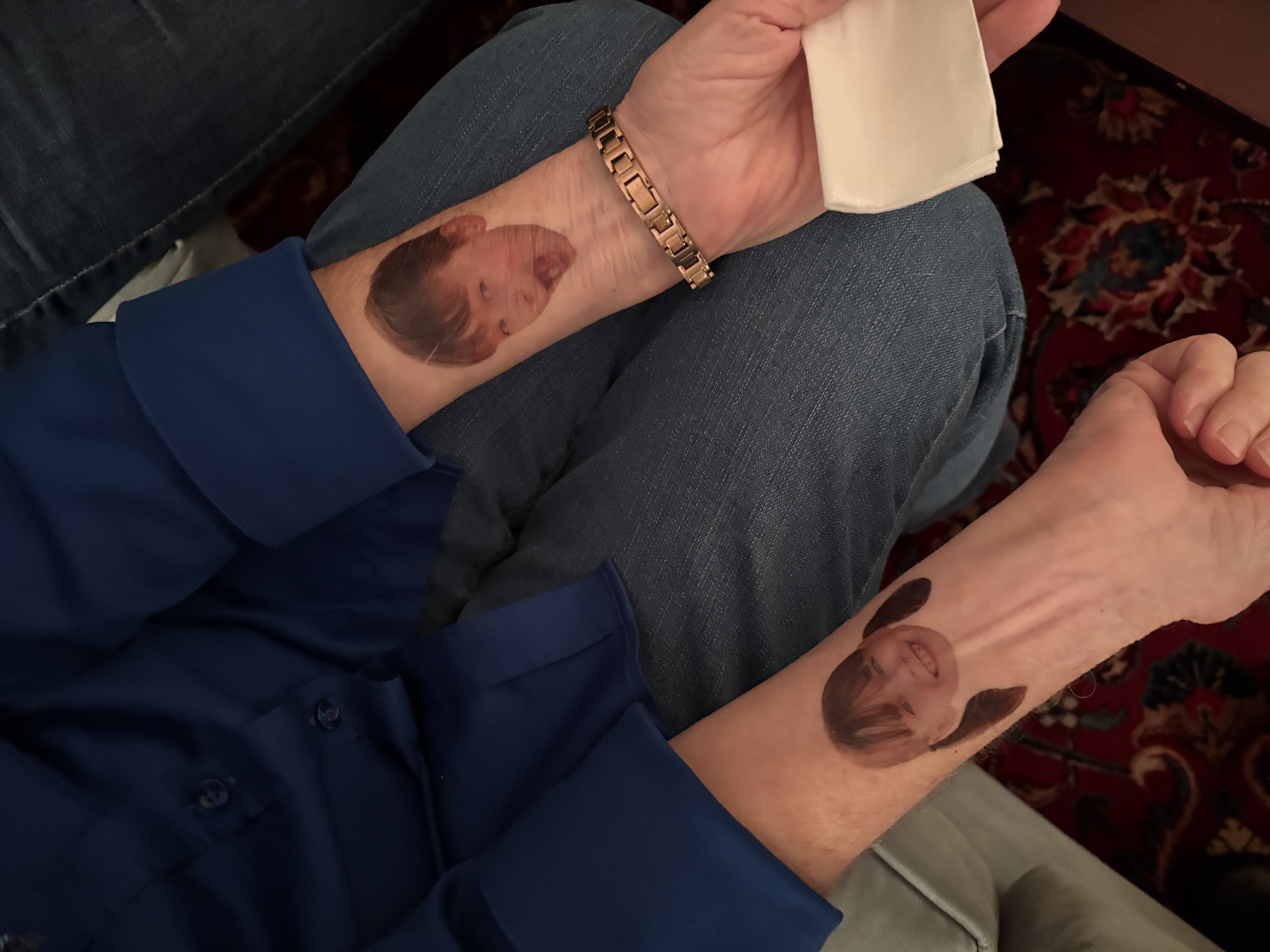 grandma with photos on both arms