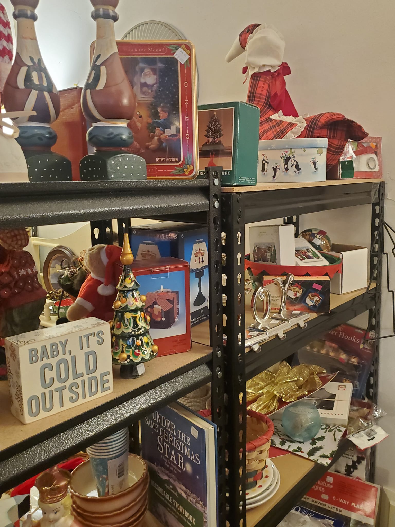 A shelf full of various wonderful antiques for resale