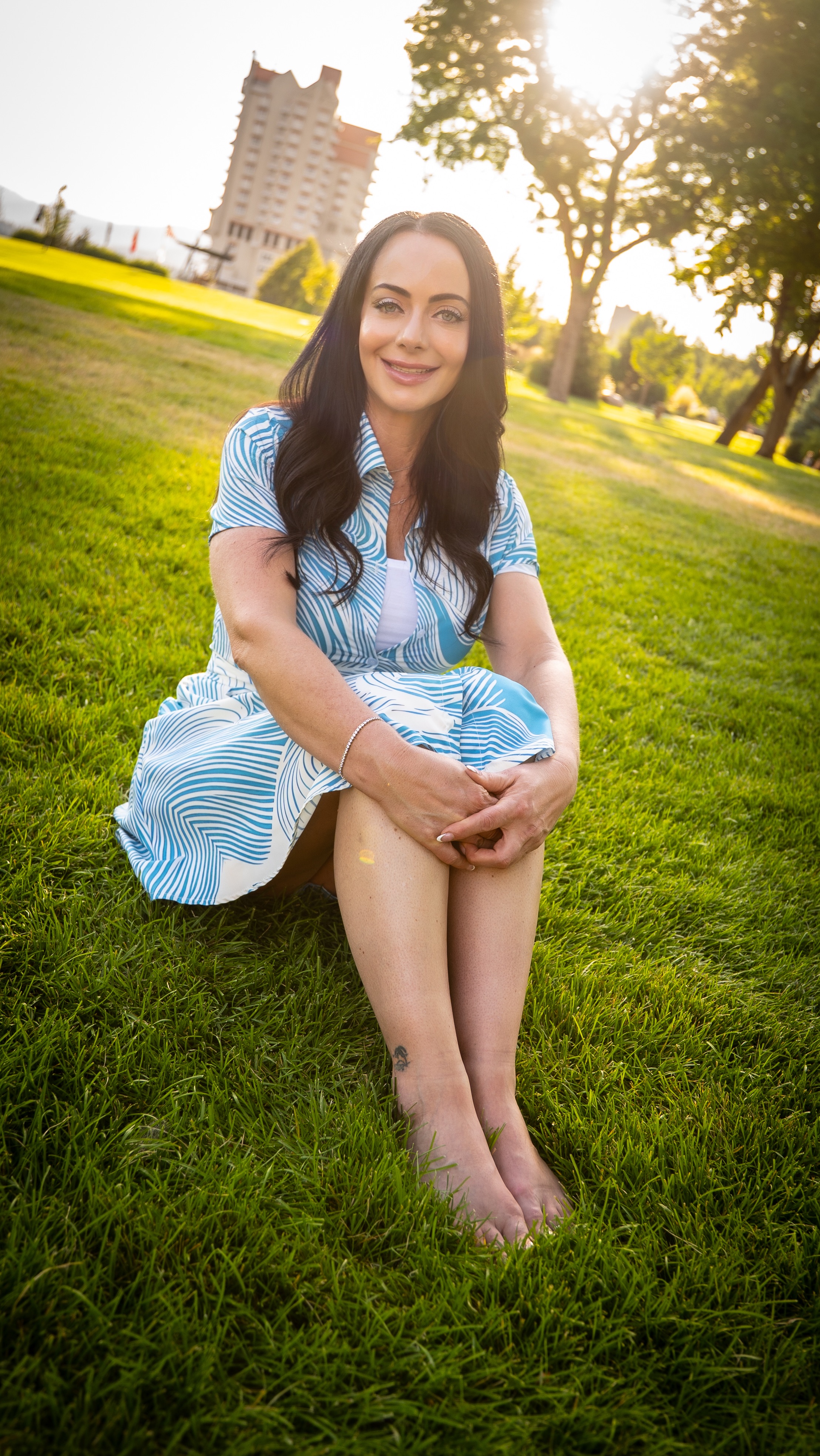 Midlife woman smiling outdoors, symbolizing personal transformation and motivation Midlife woman smiling outdoors, symbolizing personal transformation and motivation