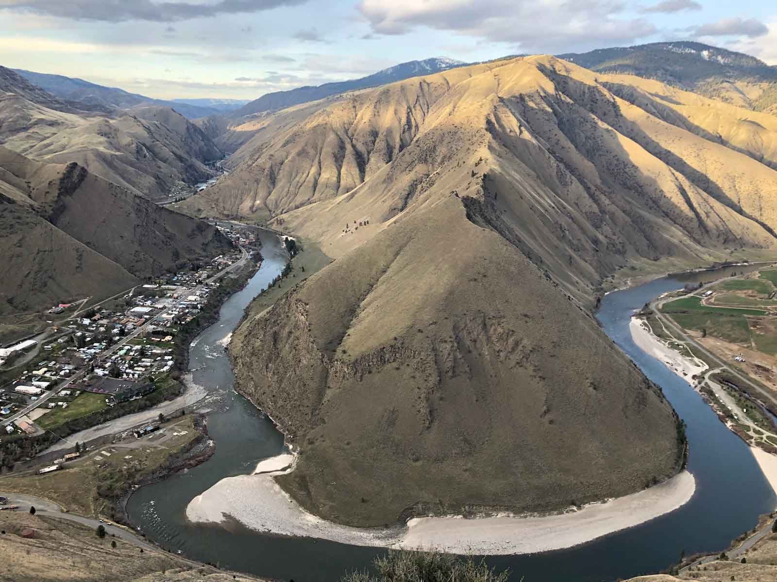 Riverside RV Park with RVs parked by a scenic river