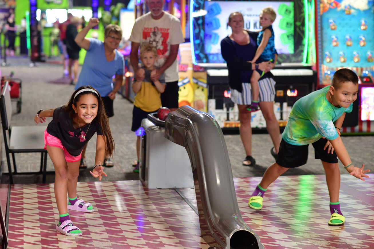 Kids bowling in Action City