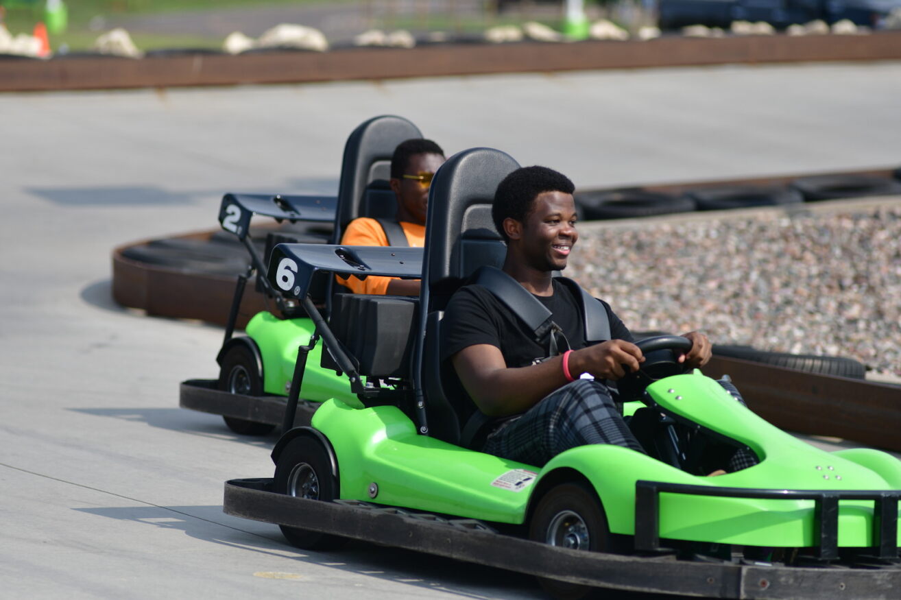 Guests riding the outdoor go-karts at Action City