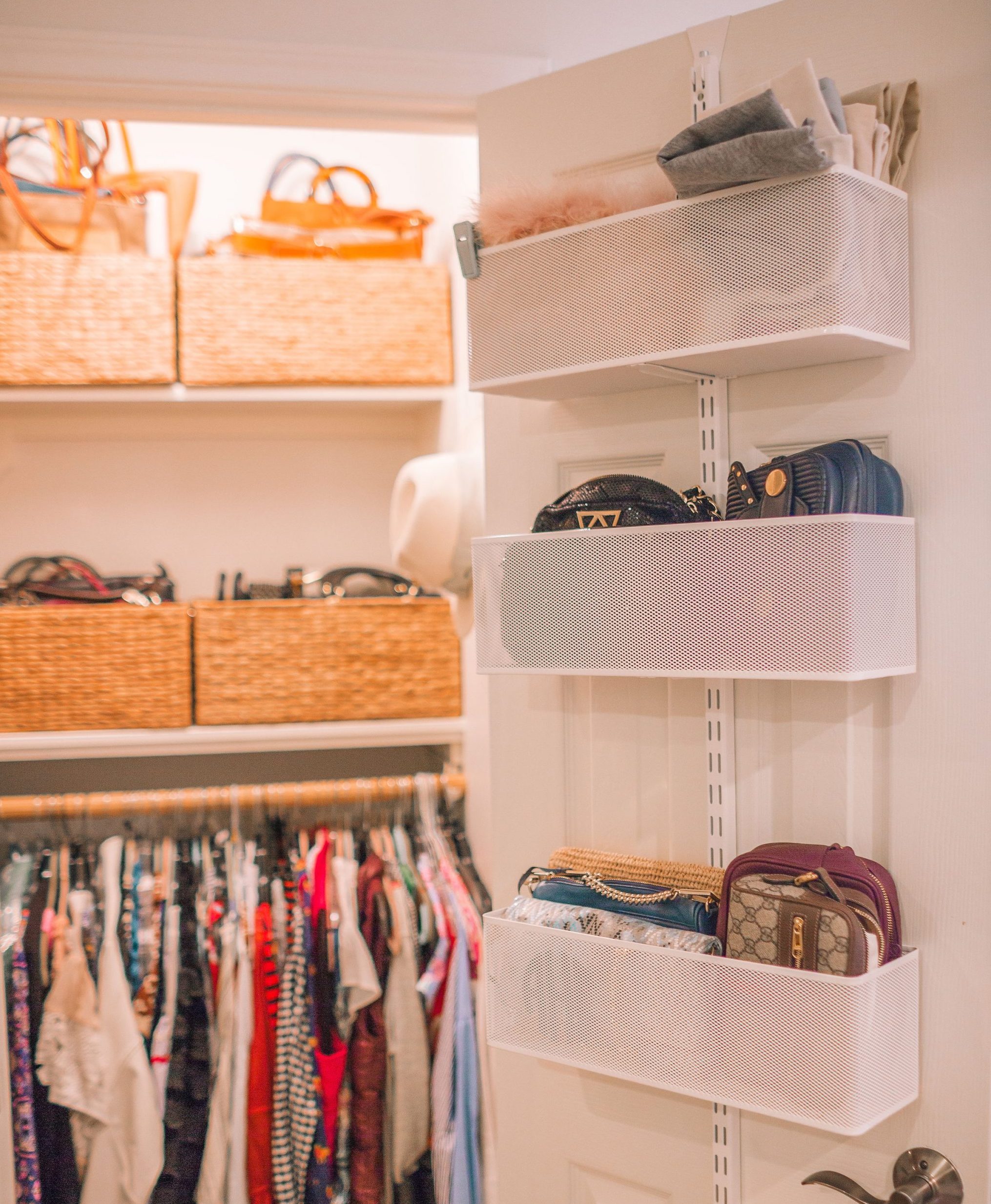 over the door hangers holding wallets in an organized closet