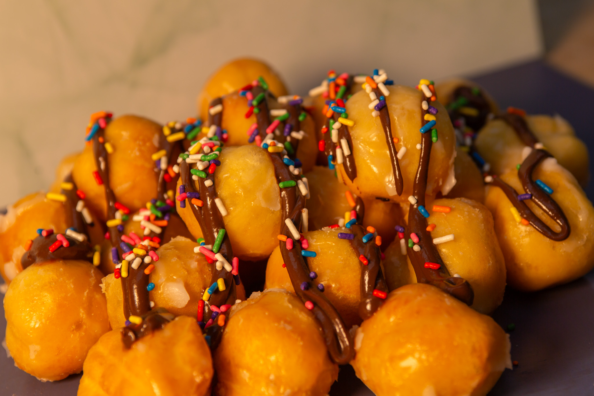 Bite-sized donut holes with various glazes