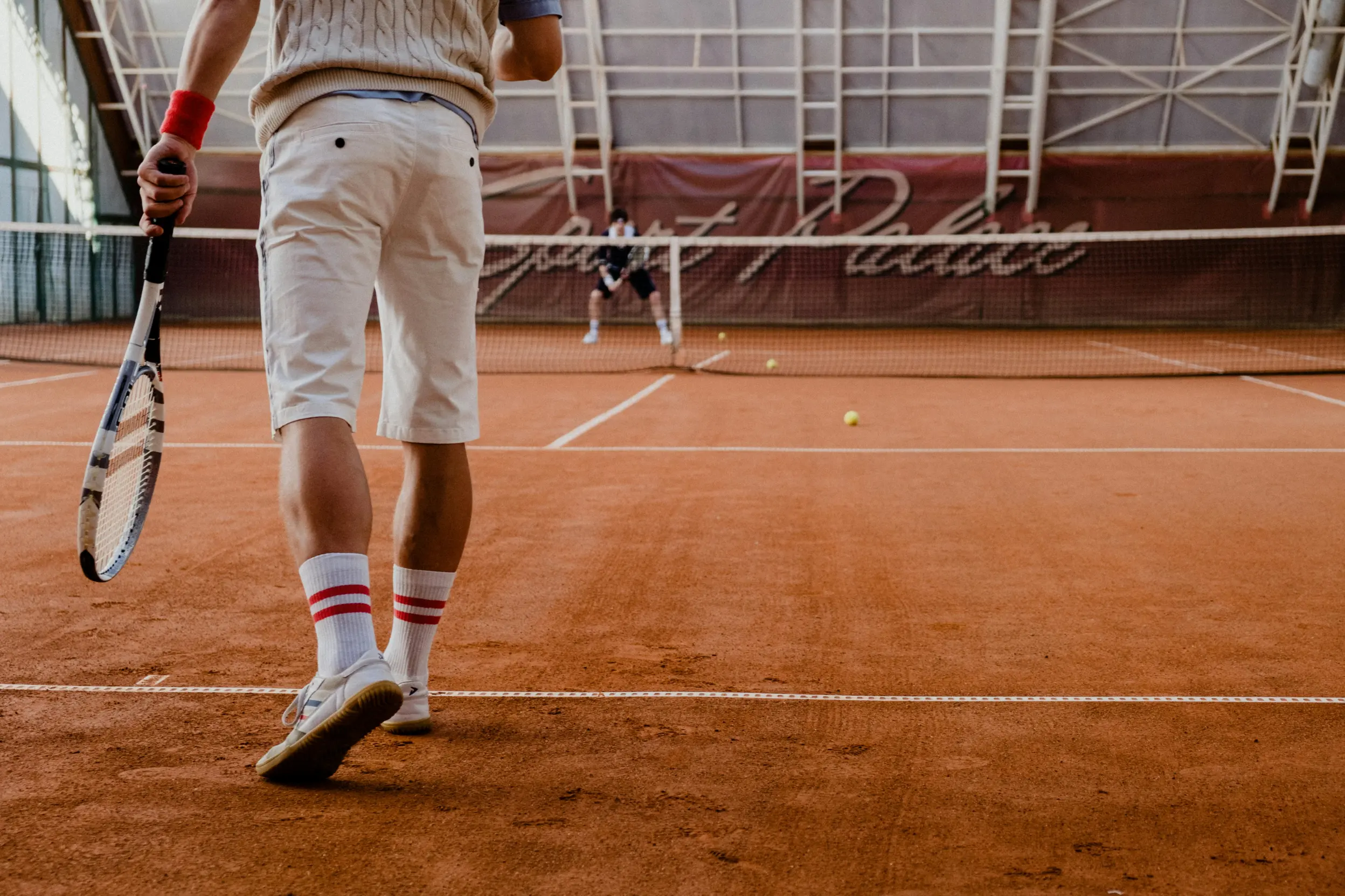 image of a player on tennis court