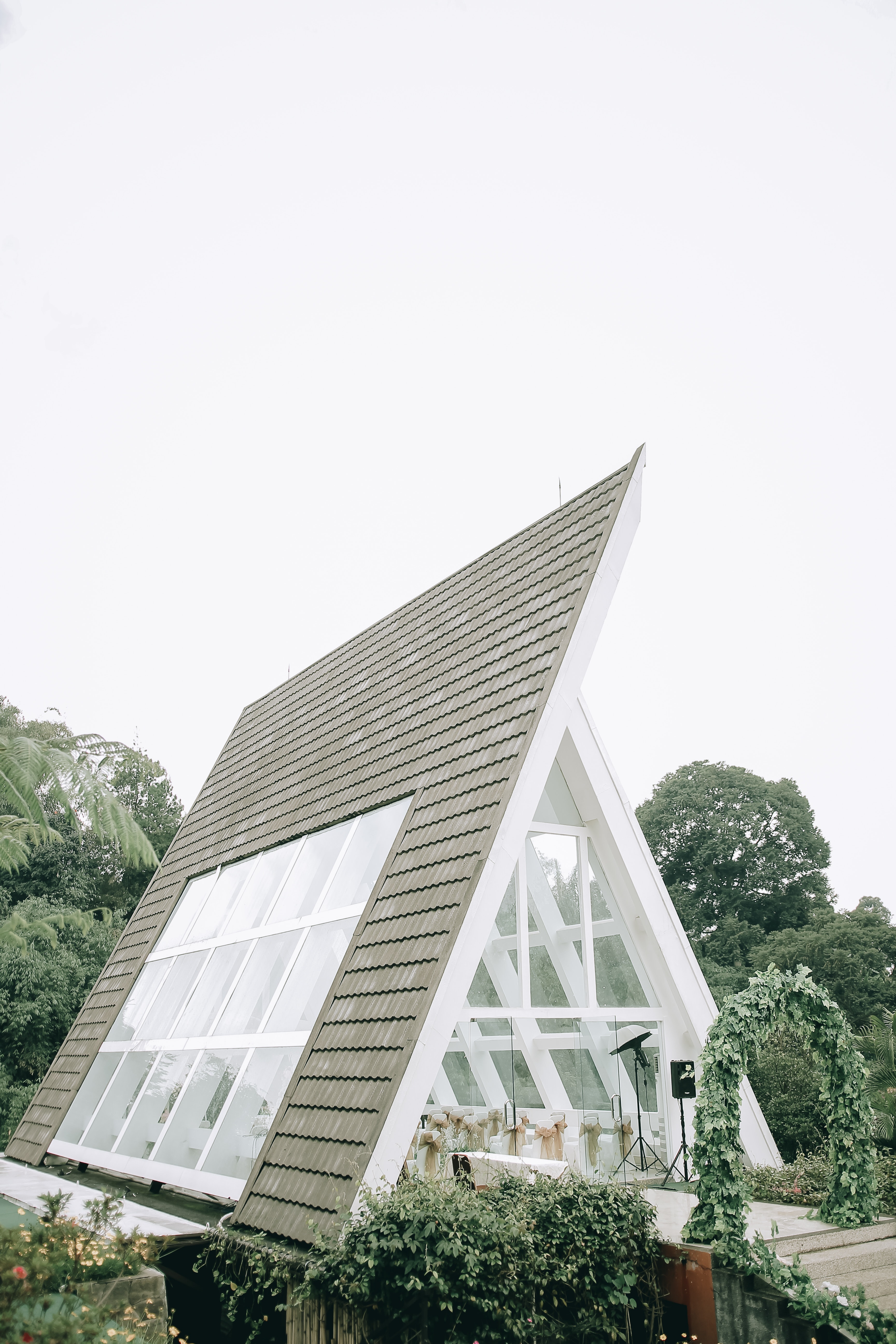 new green roofing solution with lot of windows