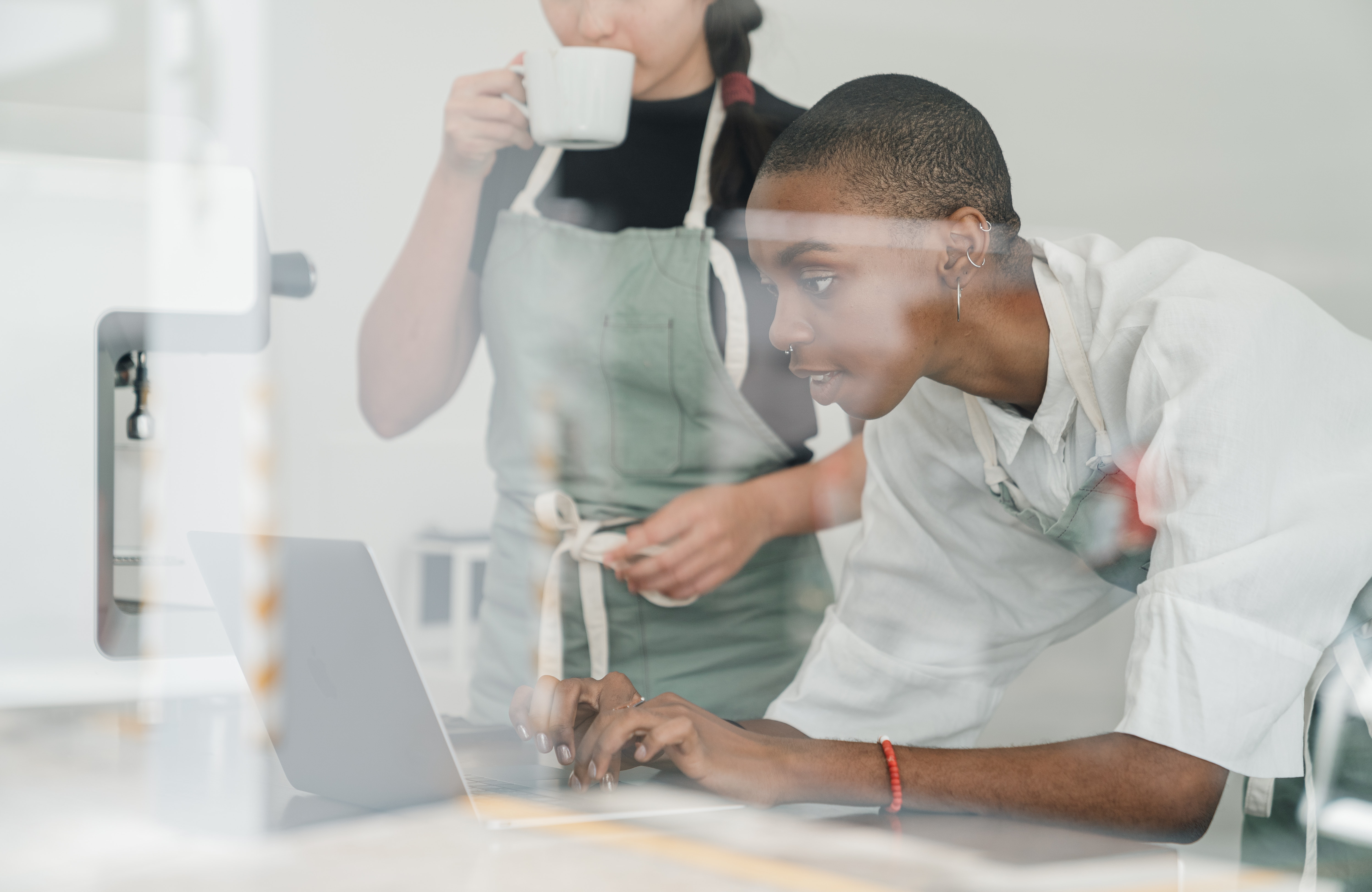 workers using laptop for social media marketing