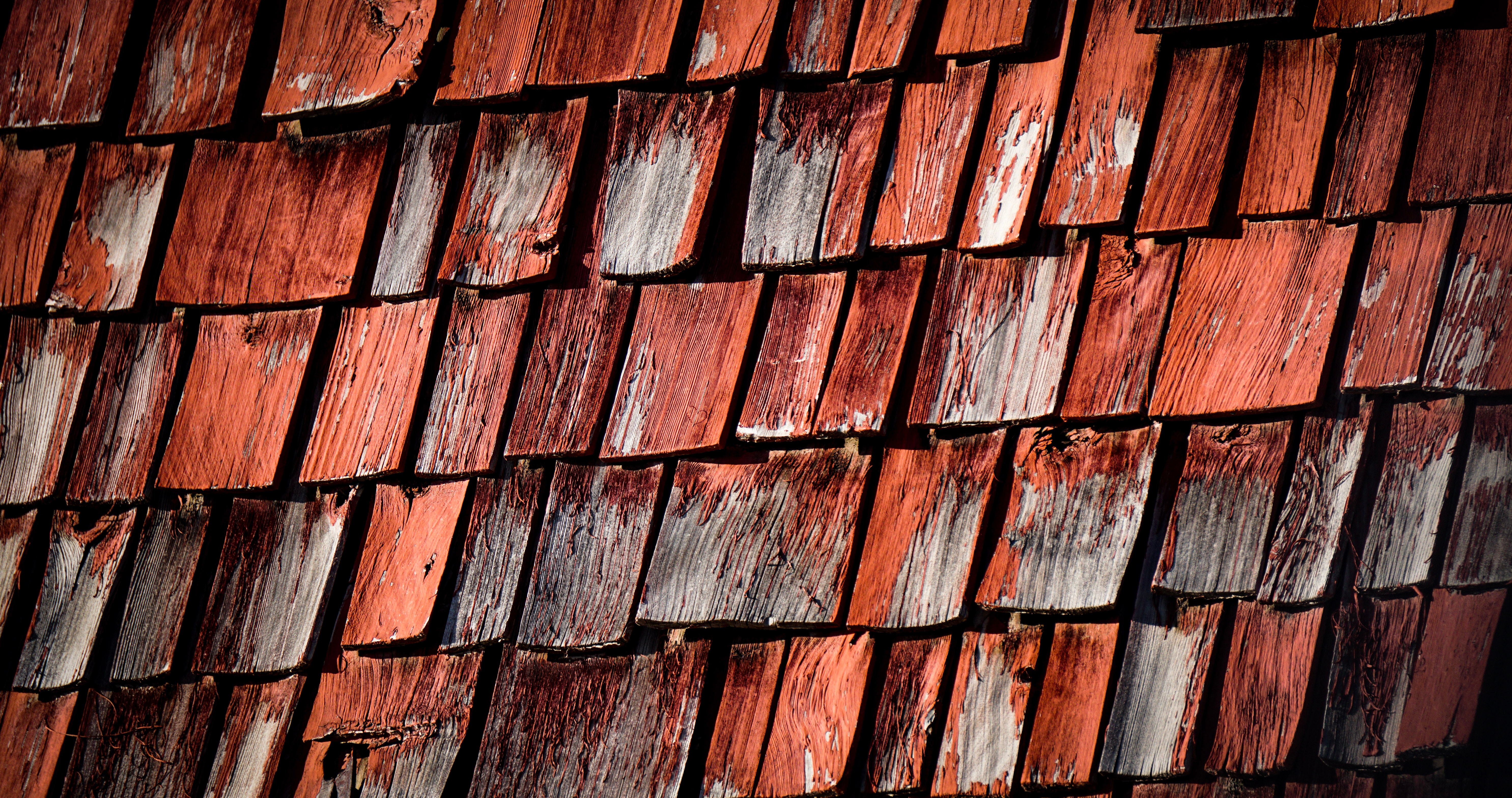roofing tiles showing damages, in need of repair and maintenance