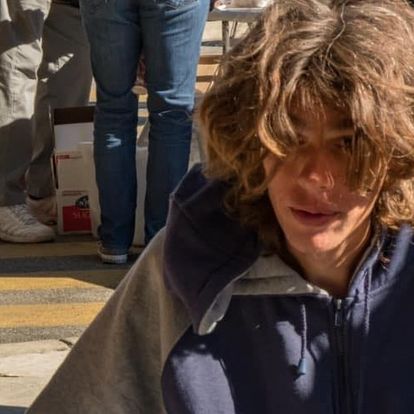 young man eating free lunch 