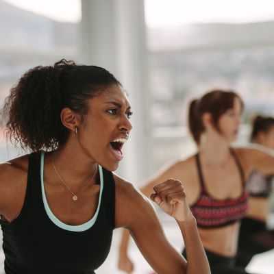 Woman exercising in class