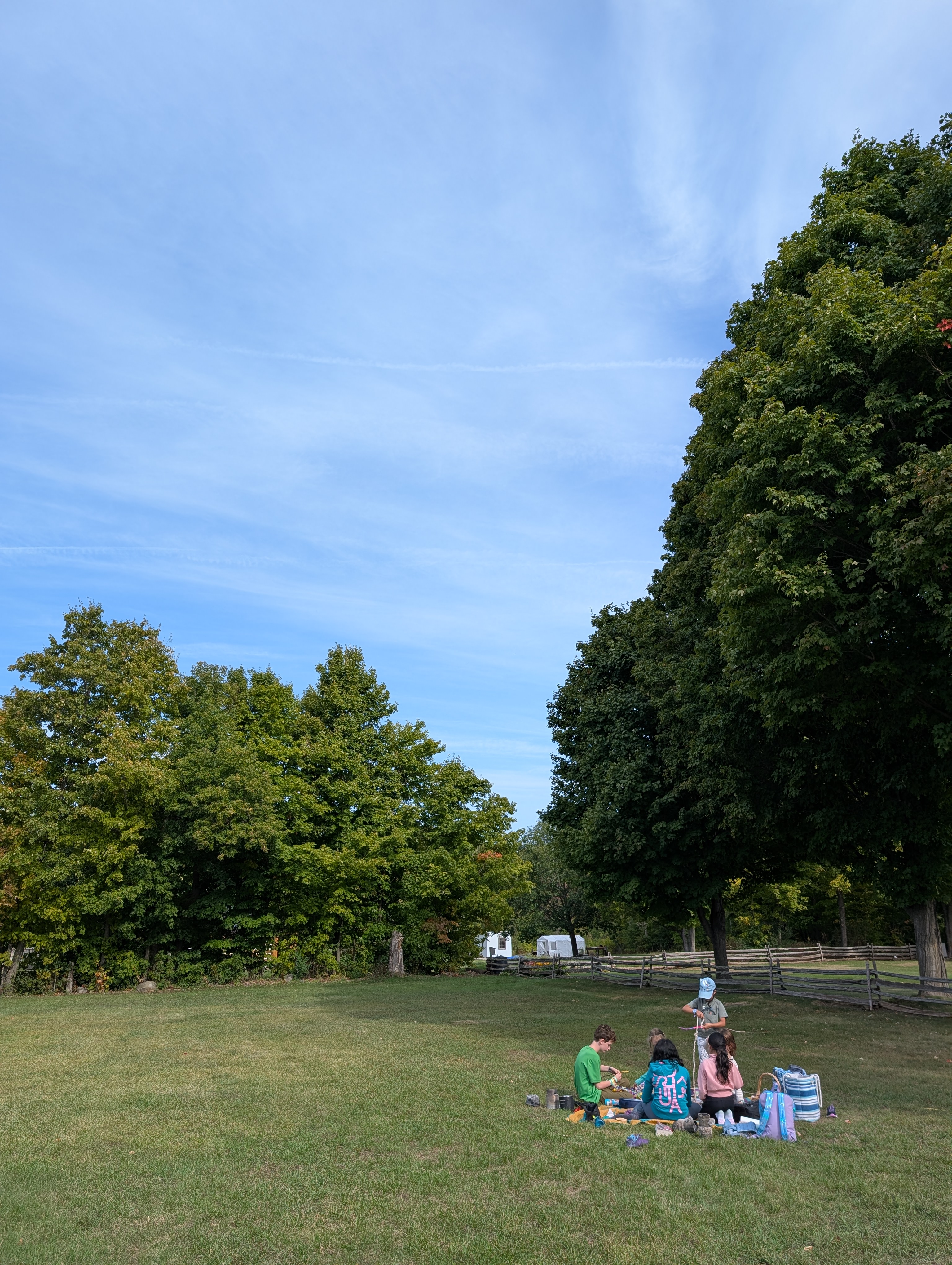Children working on knots outside