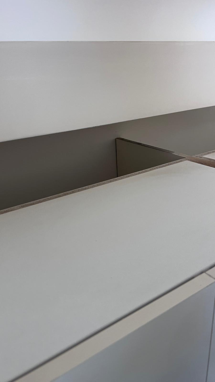 Kitchen cabinet tops after HEPA vacuuming and detailed wipe-down cleaning