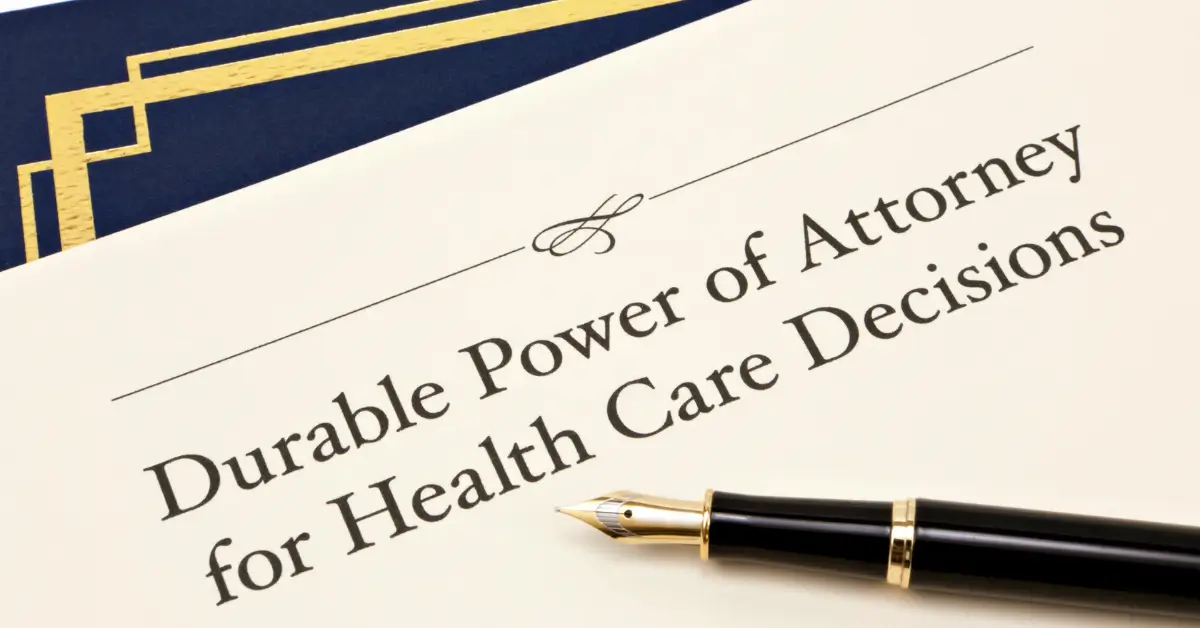 A document titled “Durable Power of Attorney for Health Care Decisions” with a black and gold fountain pen resting on it. A document titled “Durable Power of Attorney for Health Care Decisions” with a black and gold fountain pen resting on it.