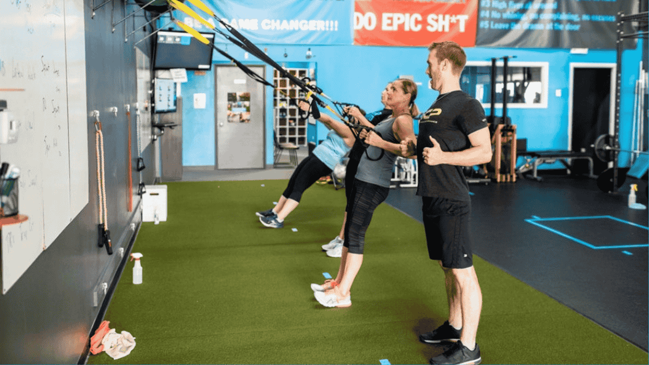 men & women atheletes working out