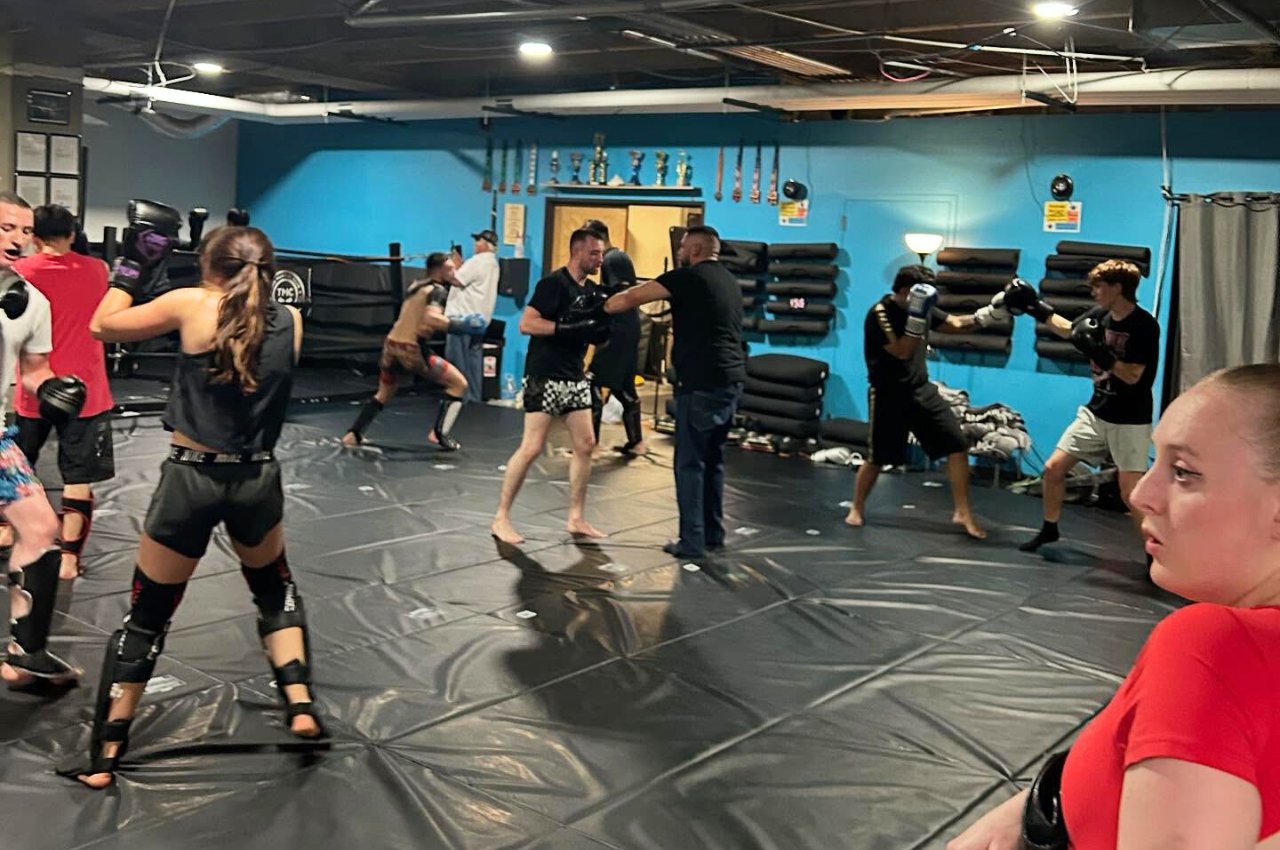 Martial arts instructor with kids