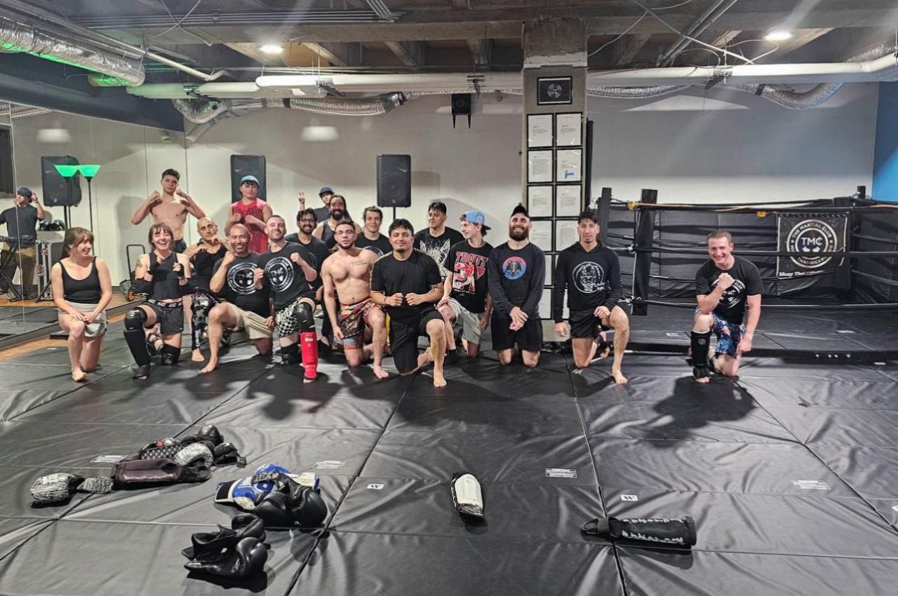 Martial arts instructor with kids