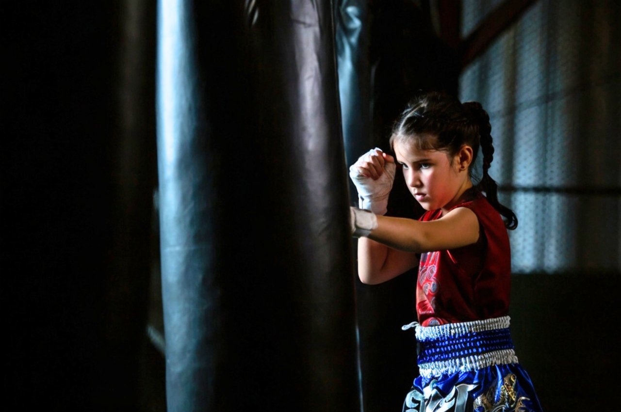 Martial arts instructor with kids