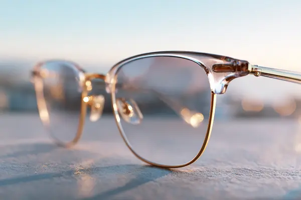 Transitions GEN S photochromic lenses demonstrating light-activated darkening technology in San Francisco sunlight