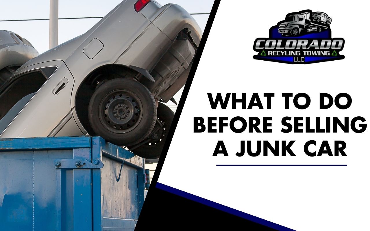 Person removing belongings from a junk car