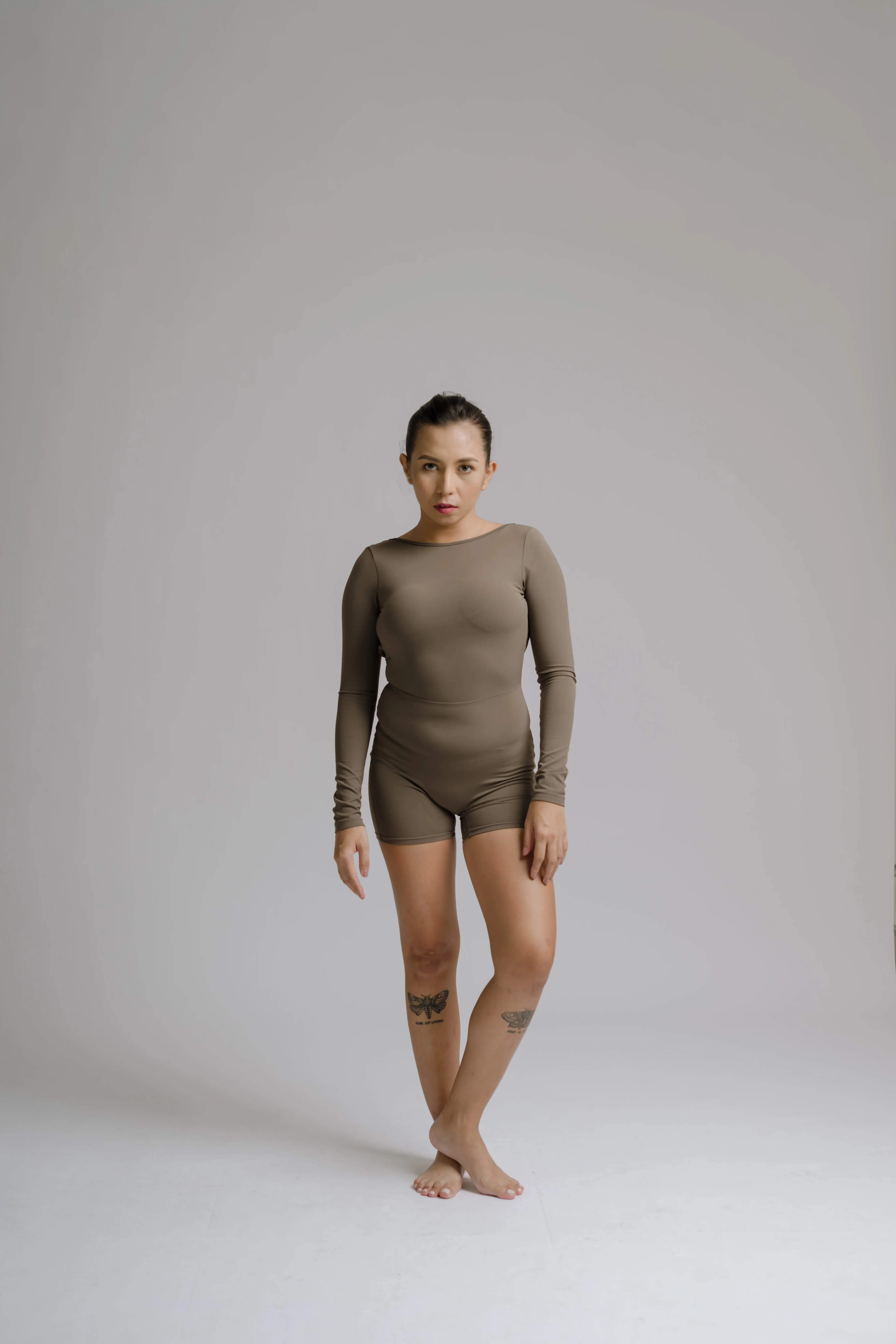 Bare Glow onesie side view