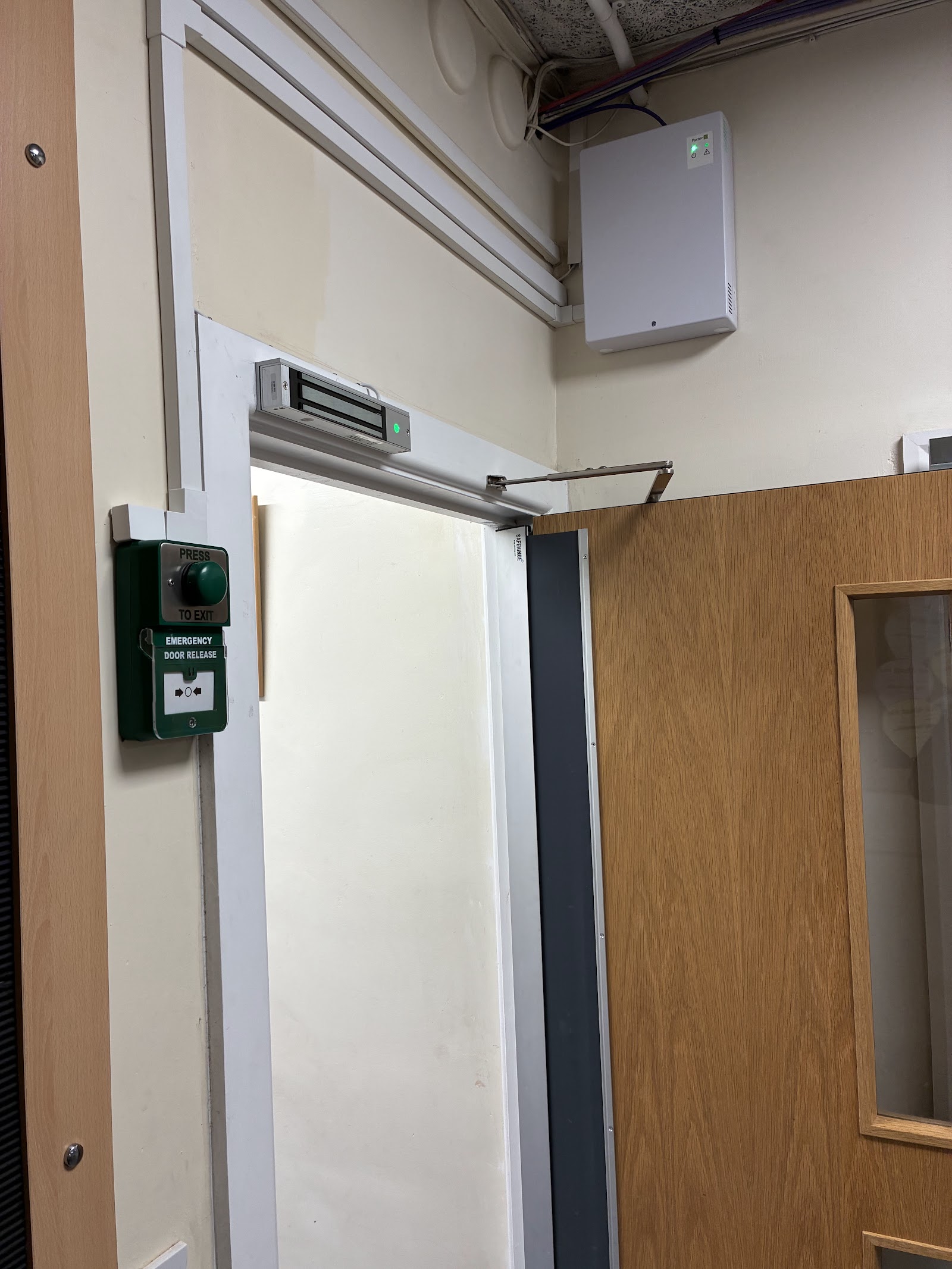 Door release control and emergency exit button installation