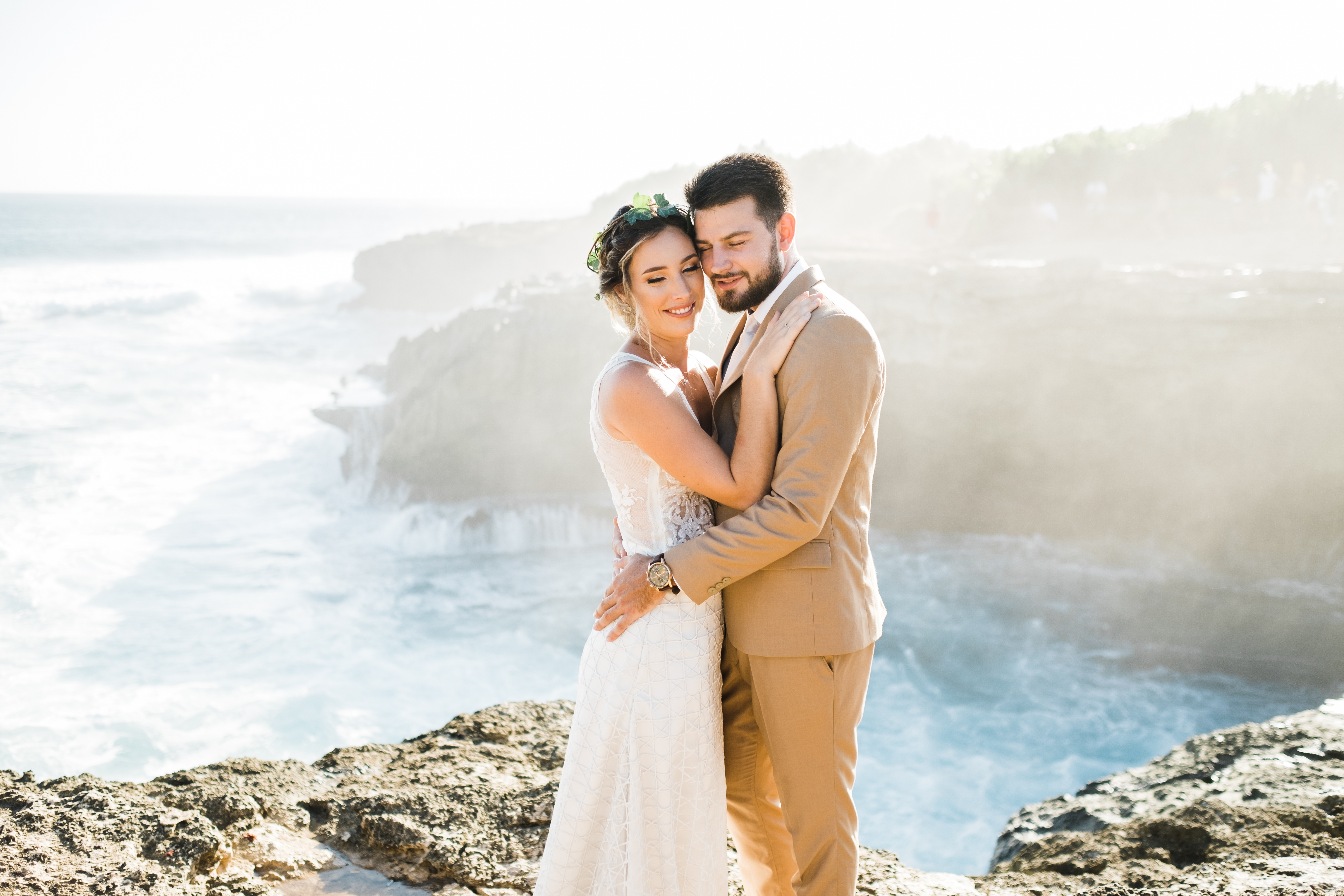 A romantic wedding ceremony setup on a beautiful beach at sunset