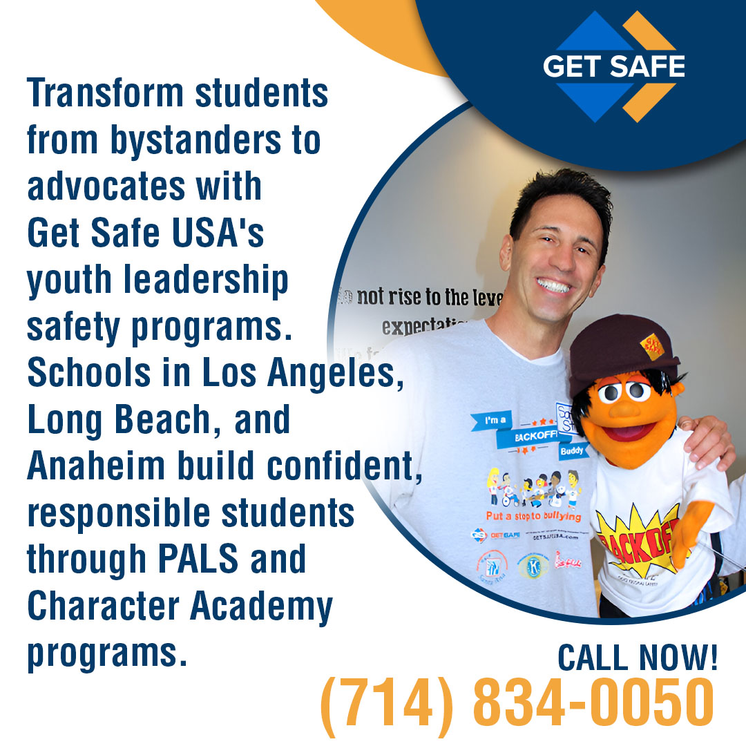 Promotional image for Get Safe USA showing a smiling male instructor posing with an orange puppet. Promotional image for Get Safe USA showing a smiling male instructor posing with an orange puppet.