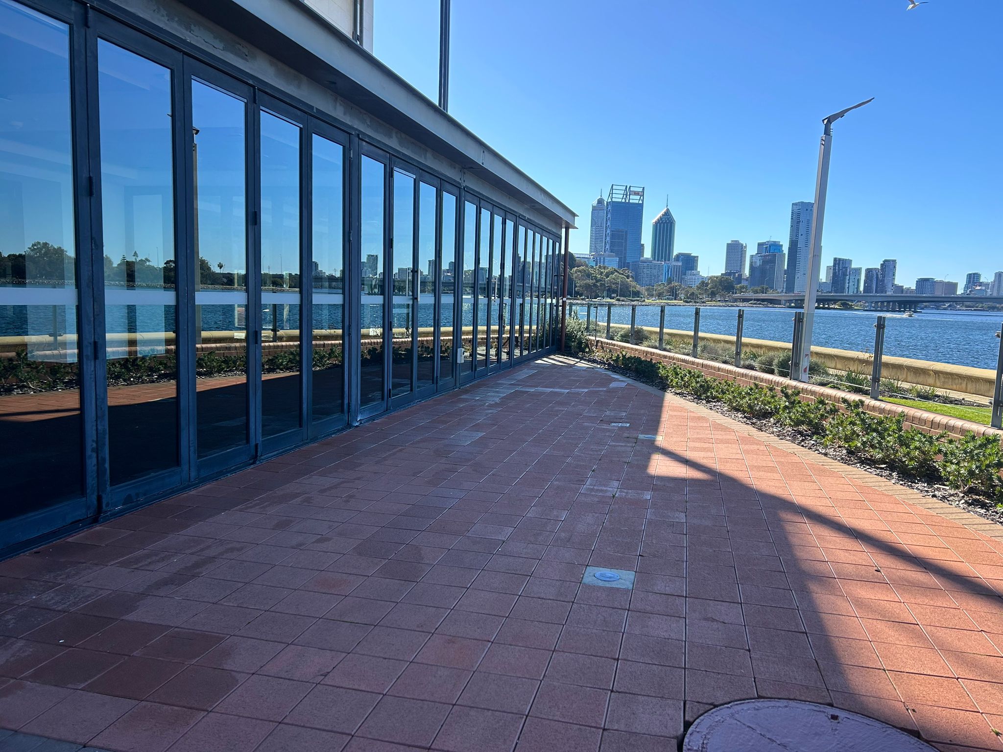Window cleaning team at work on multi-storey building — Purified Group Perth CBD