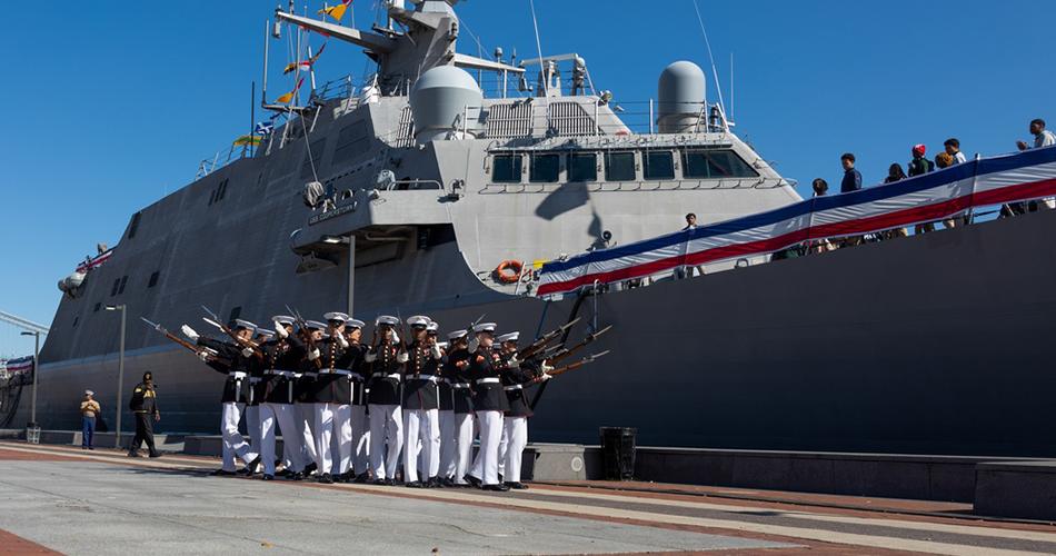 San Diego waterfront with U.S. Navy ships and city skyline, representing the 250th Navy and Marine Corps birthday celebration and its impact on real estate.