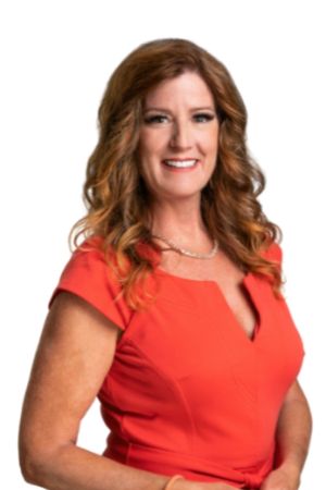 Marcia Riner in an orange dress Marcia Riner in an orange dress