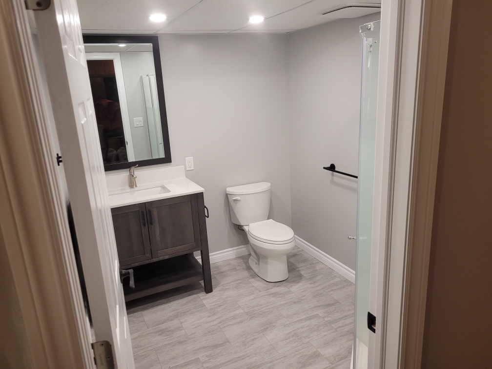 Elegant drop ceiling design in a newly renovated Fonthill bathroom.