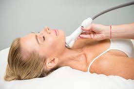 woman receiving a radio frequency treatment woman receiving a radio frequency treatment