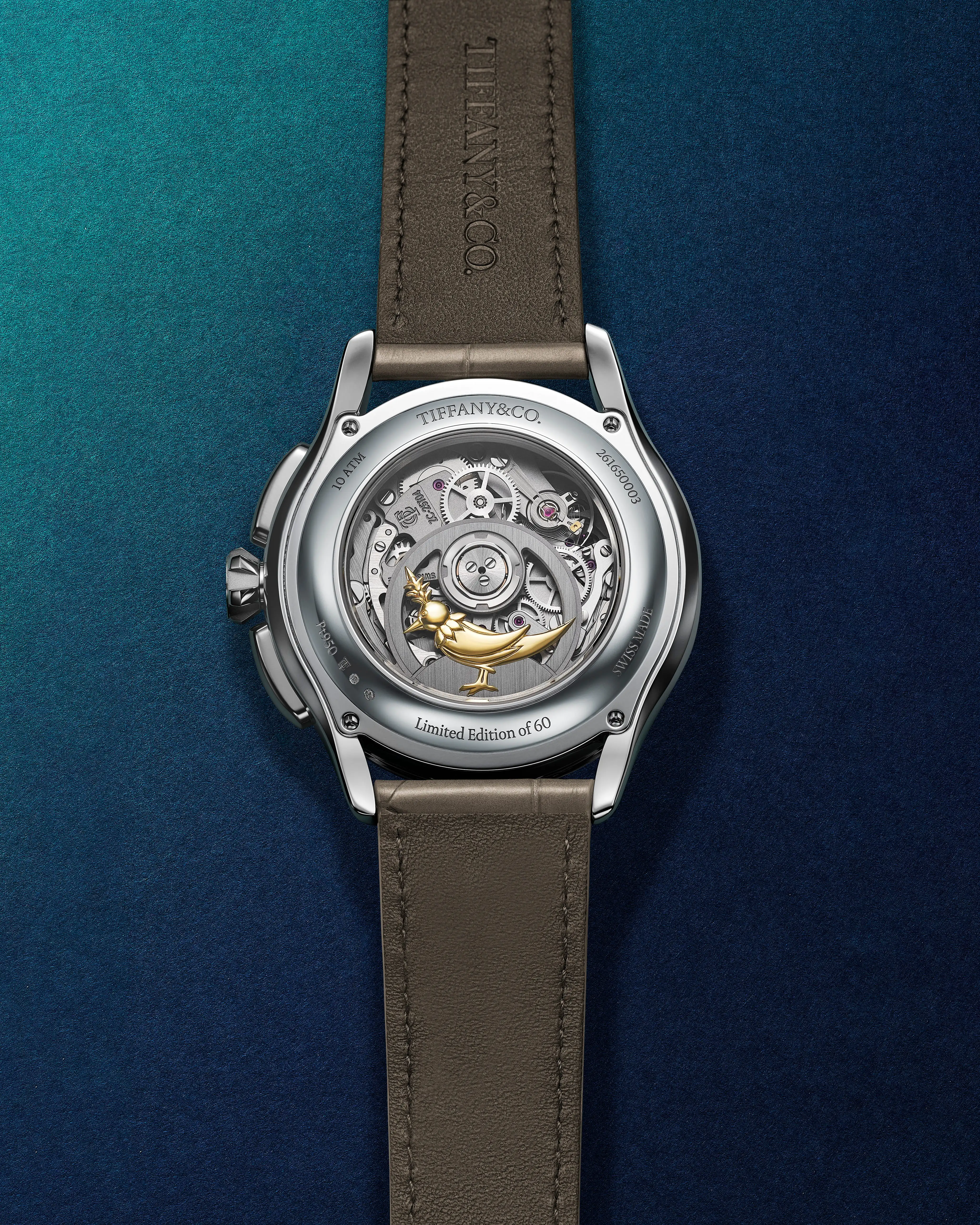 Case profile of the Tiffany Timer showing curved chronograph pushers and taupe alligator strap