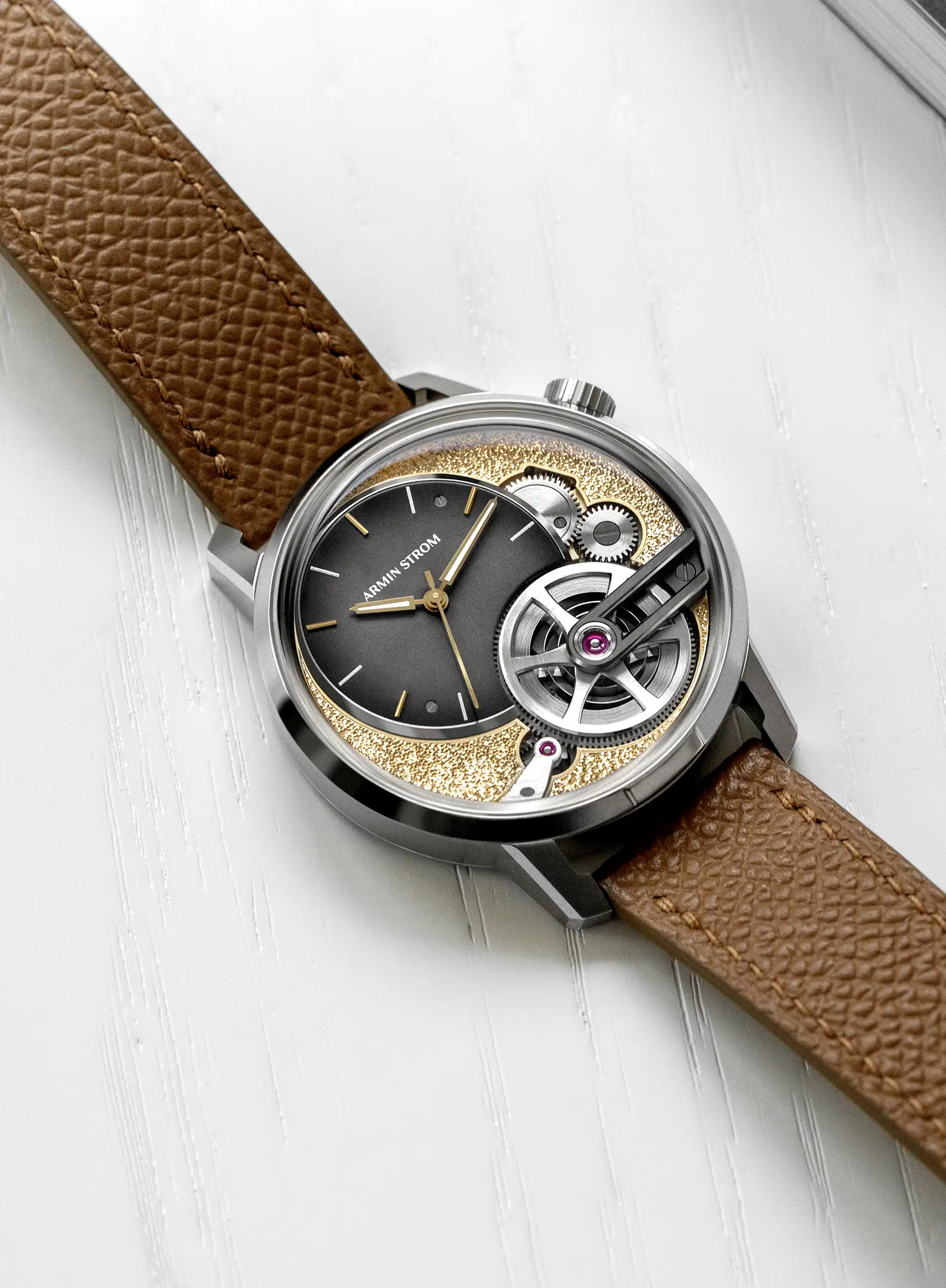 Side profile of the Armin Strom Tribute² Aurum in stainless steel with taupe Epsom strap