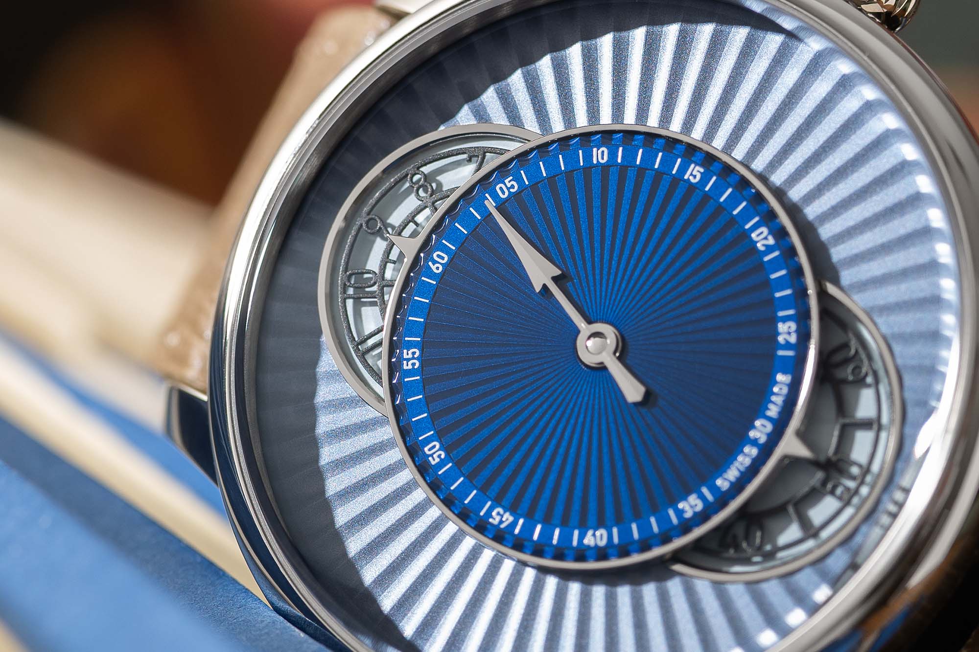 Close-up of the skeletonized hour and seconds discs on the Louis Erard x Worn & Wound regulator dial