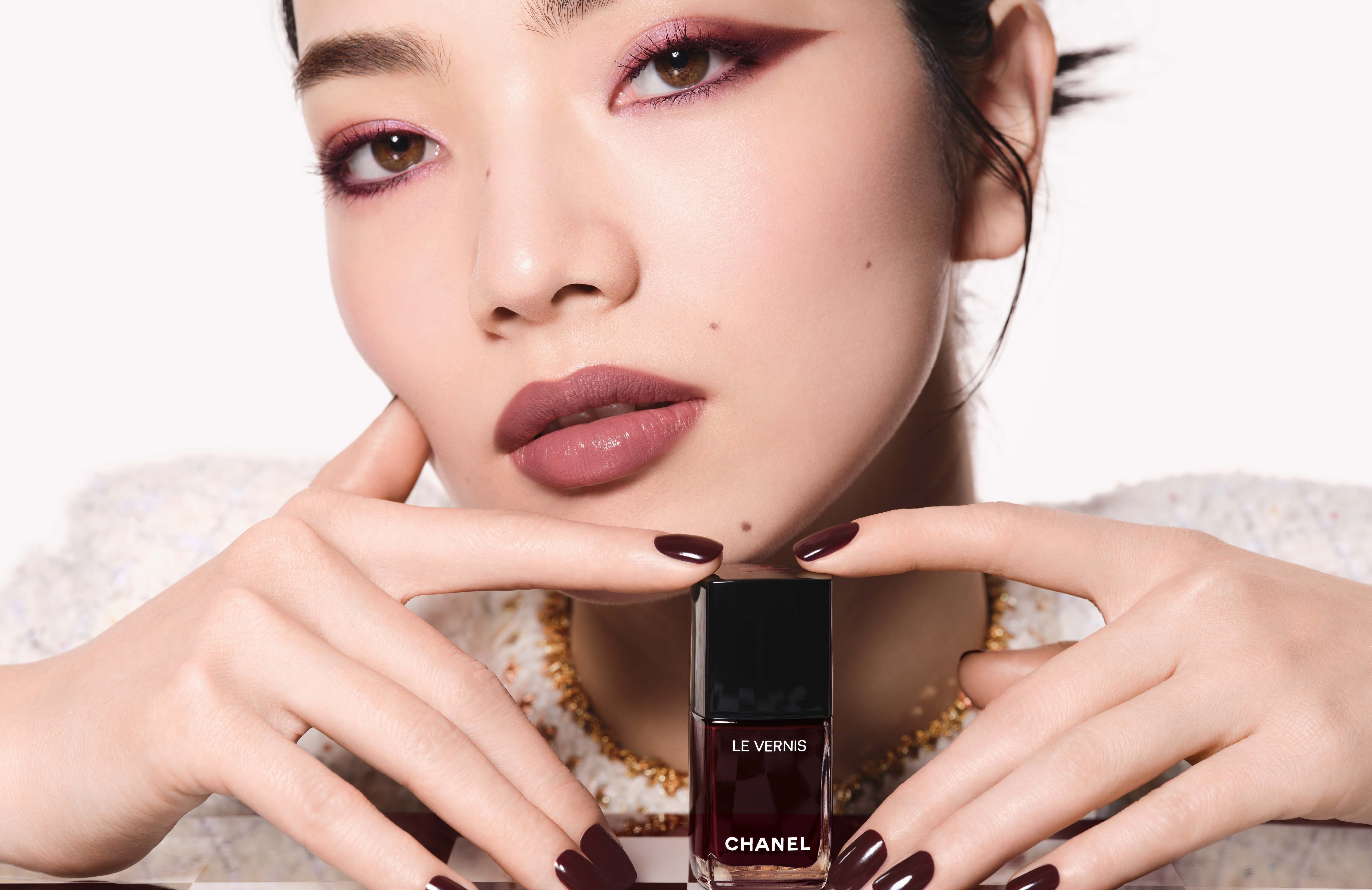 Detail of CHANEL Rouge Noir eye and lip look in deep garnet hues