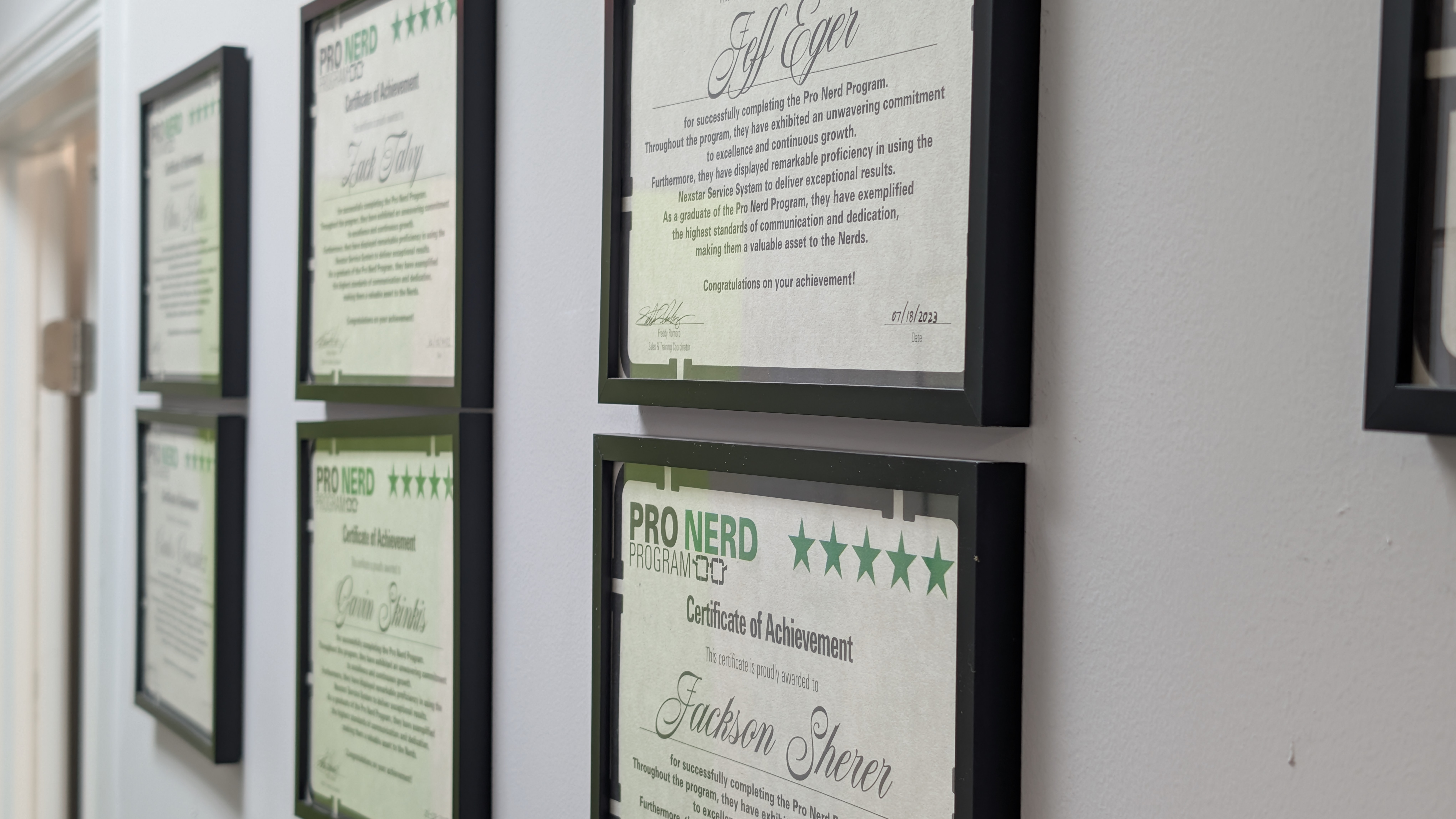 Close-up of ProNerd certifications earned by Plumbing, Cooling, and Electrical Nerds technicians. Close-up of ProNerd certifications earned by Plumbing, Cooling, and Electrical Nerds technicians.