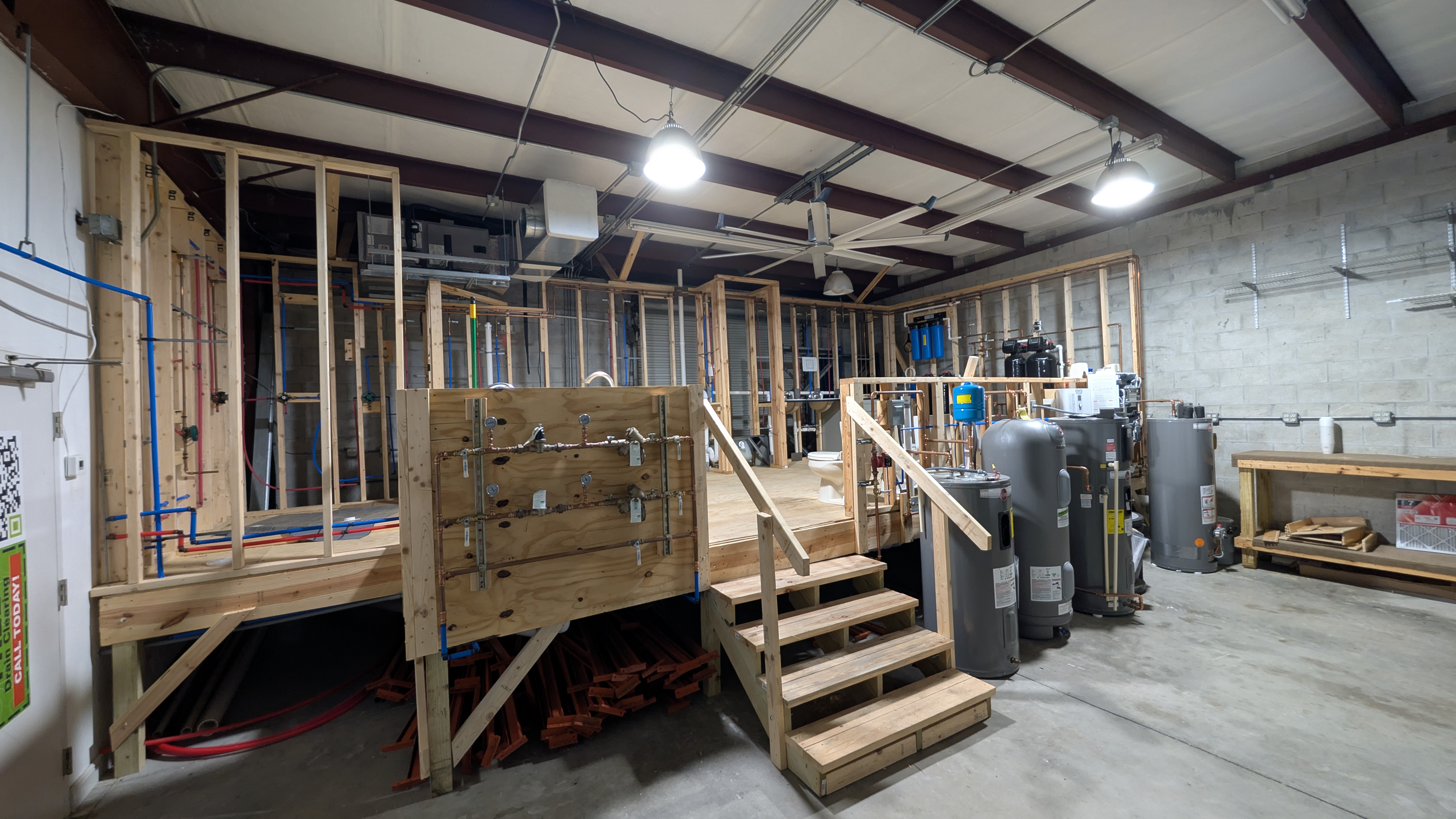 Plumbing training setup at Plumbing, Cooling, and Electrical Nerds, designed for practical skill development. Plumbing training setup at Plumbing, Cooling, and Electrical Nerds, designed for practical skill development.