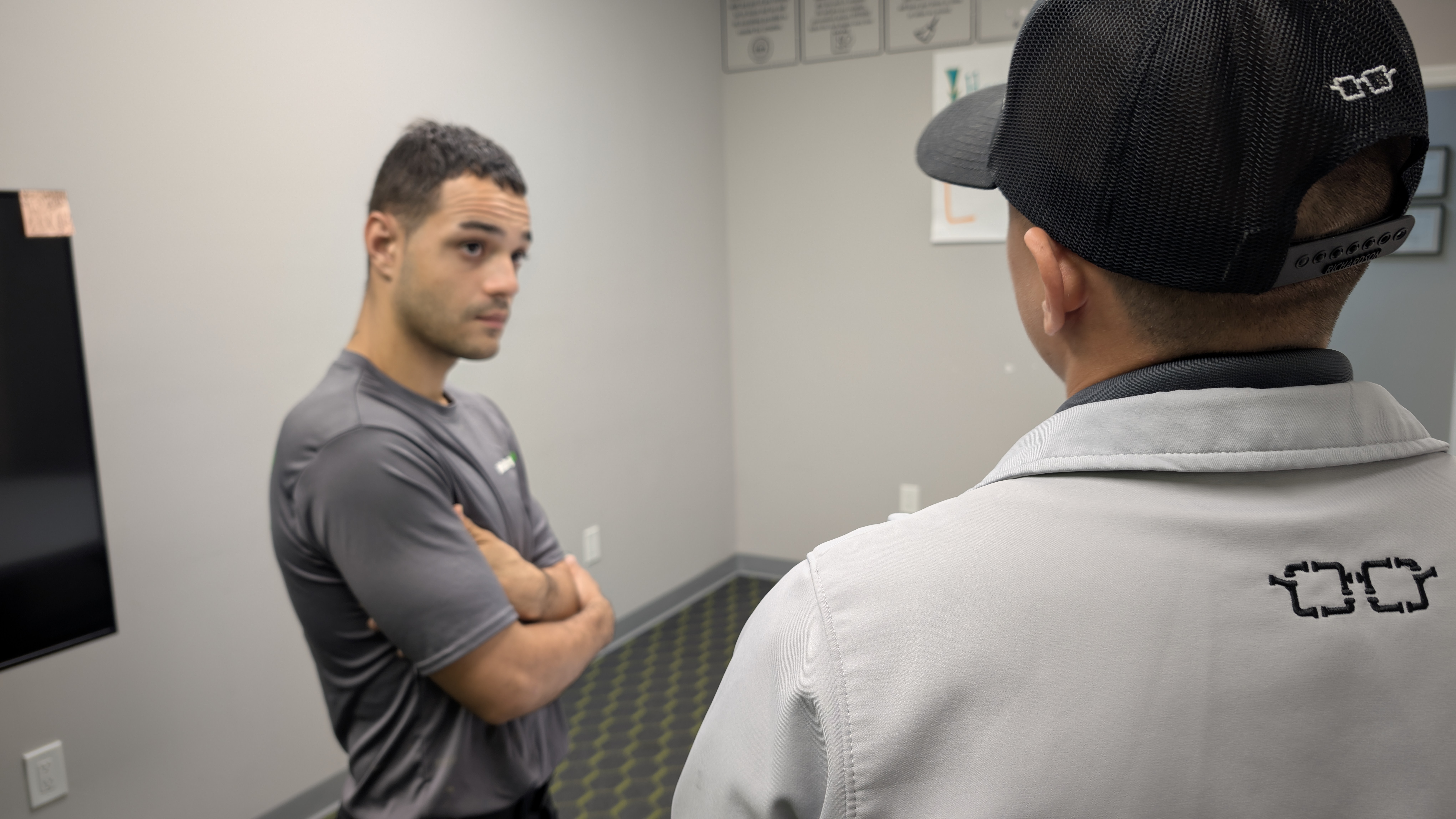 Chris Robles reviews call highlights with Freddy Romero, using the Rilla AI app, during a one-on-one coaching session at Plumbing, Cooling, and Electrical Nerds. Chris Robles reviews call highlights with Freddy Romero, using the Rilla AI app, during a one-on-one coaching session at Plumbing, Cooling, and Electrical Nerds.
