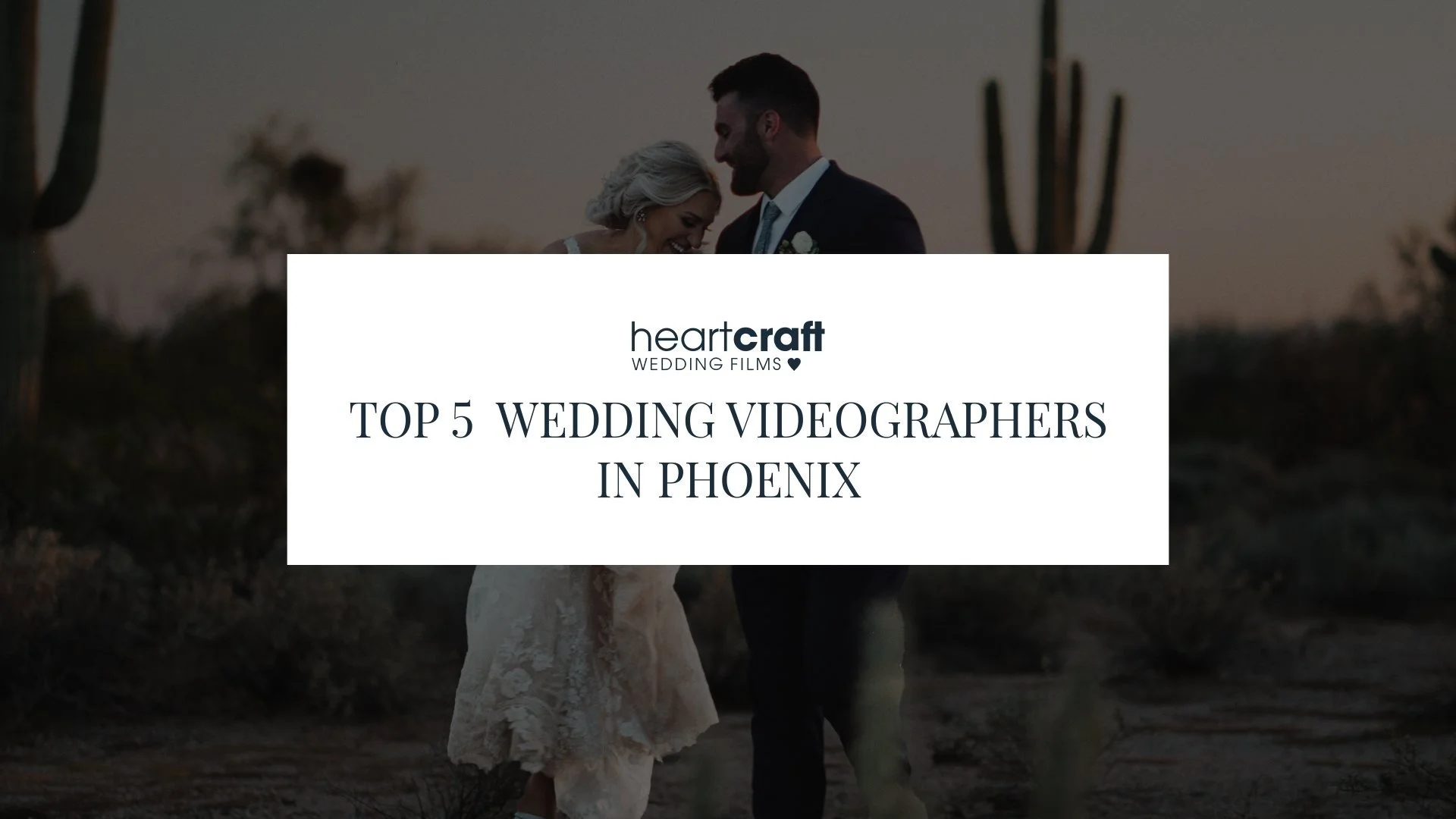 Bride and groom smiling together at sunset in the Arizona desert with saguaro cacti in the background, overlaid with the Heartcraft Wedding Films logo and the text “Top 5 Wedding Videographers in Phoenix.” Bride and groom smiling together at sunset in the Arizona desert with saguaro cacti in the background, overlaid with the Heartcraft Wedding Films logo and the text “Top 5 Wedding Videographers in Phoenix.”