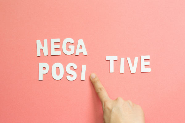 An image showing letters of the words "Negative" & "Positive".