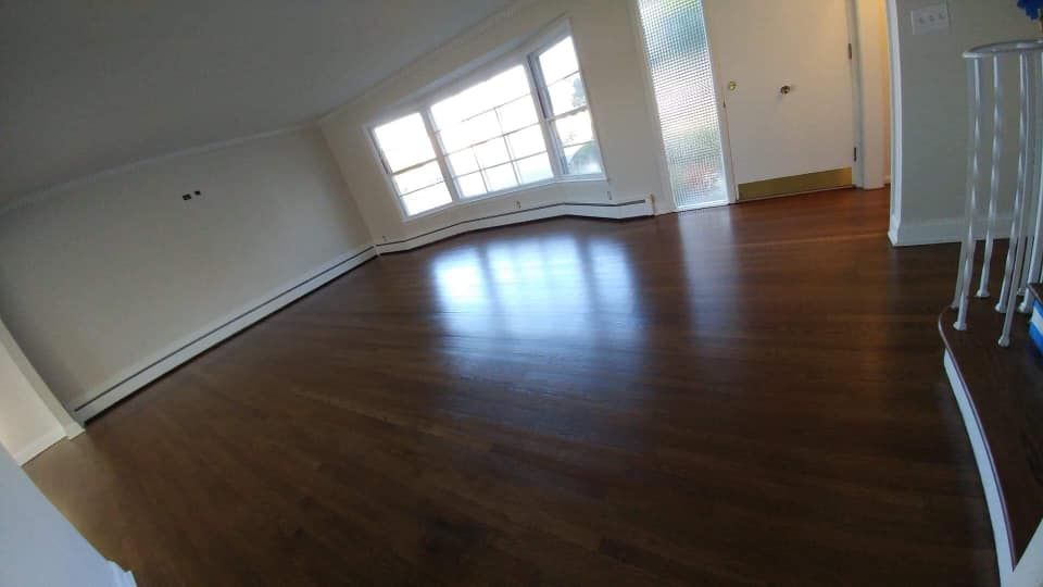 Professionally installed bedroom floor tiles with a seamless finish