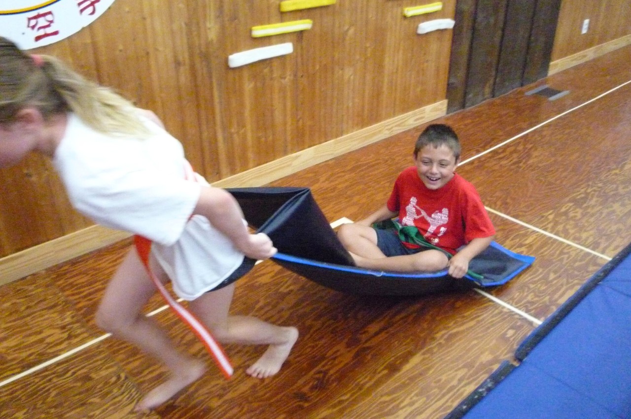 Martial arts instructor with kids