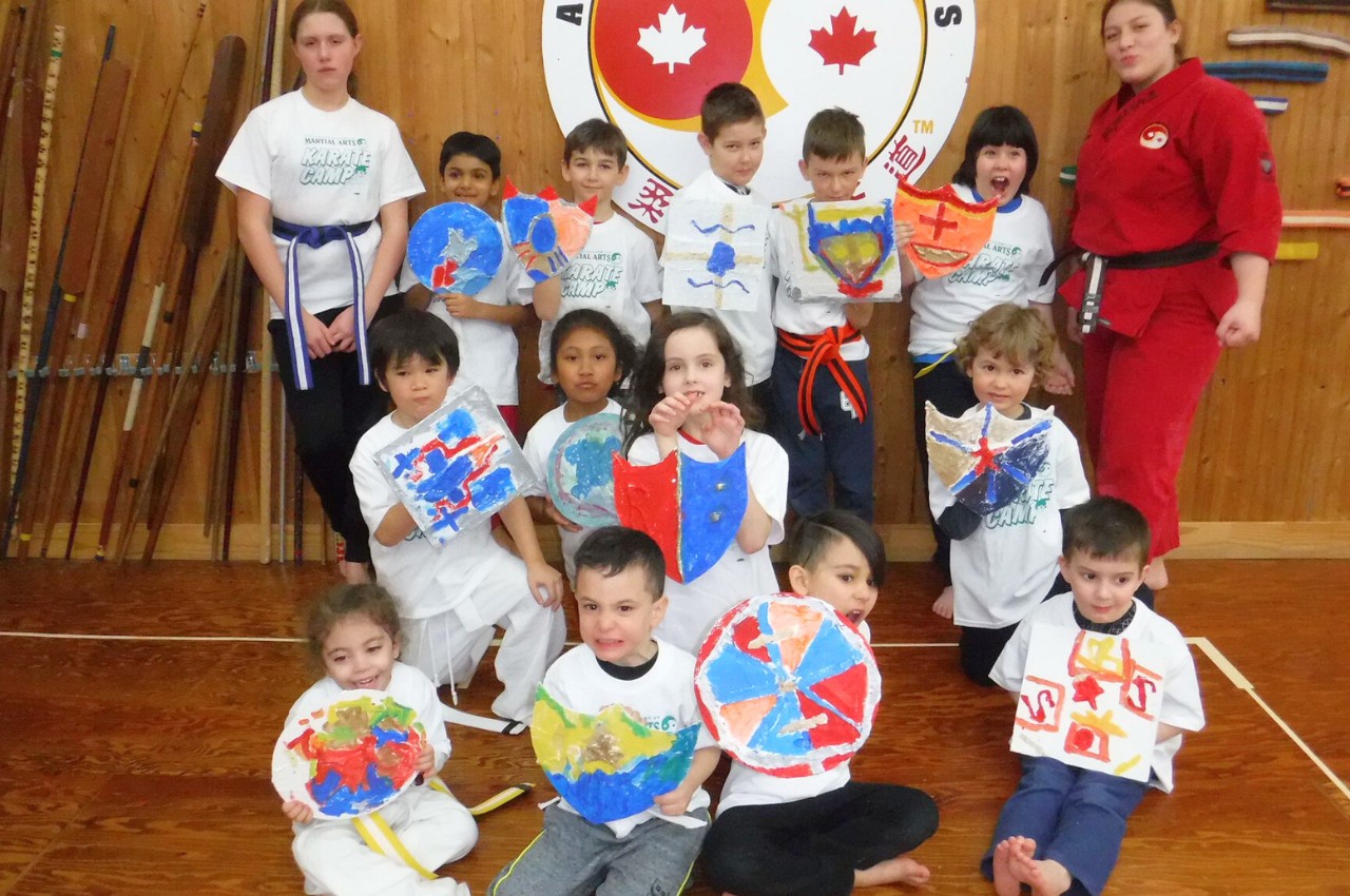 Martial arts instructor with kids