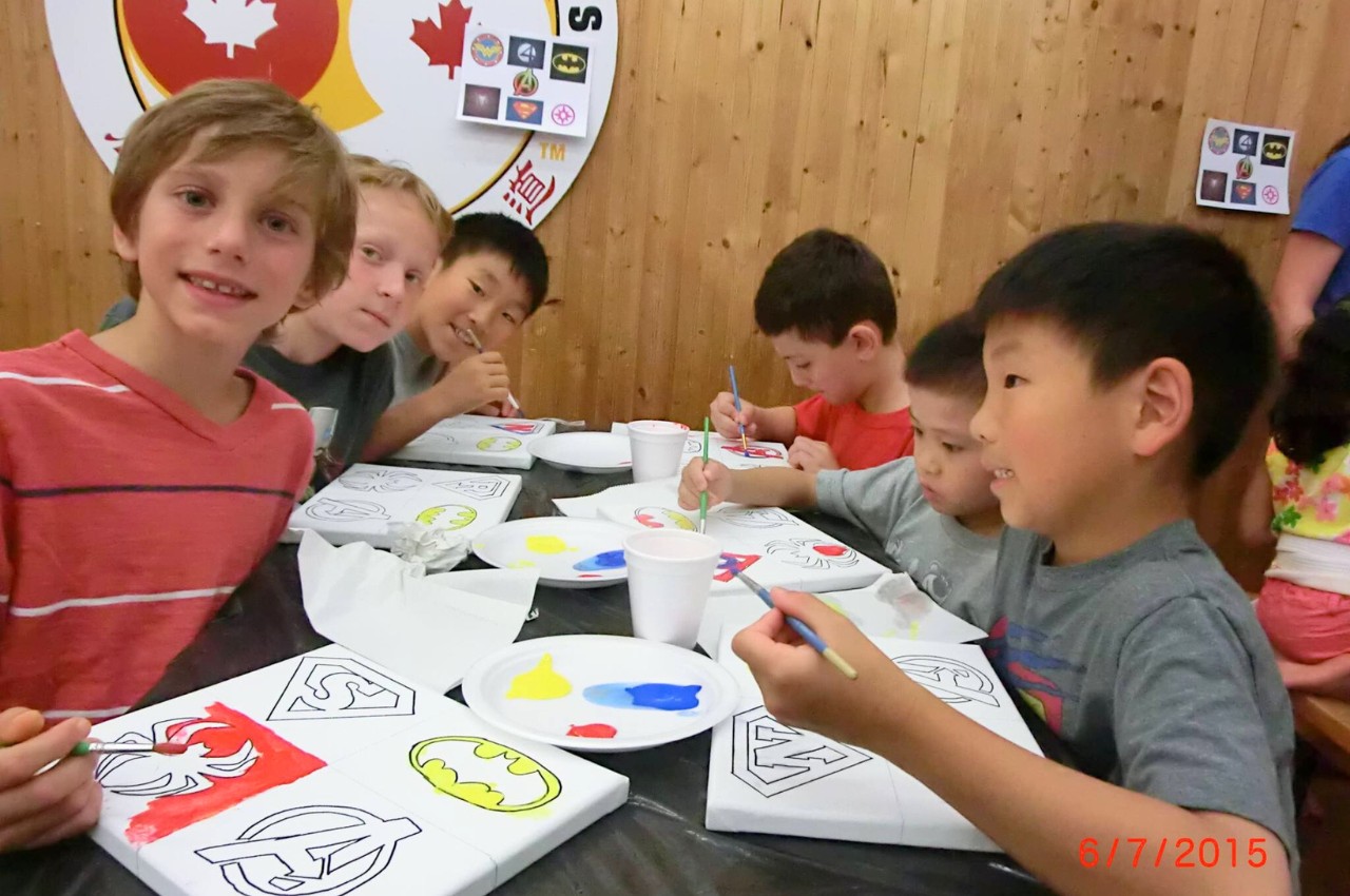 Martial arts instructor with kids